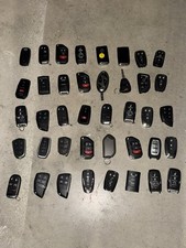 Lot of 40 Misc Used Smart Remote Keys picture
