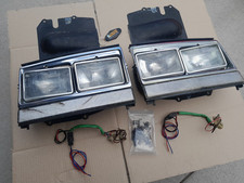 78-85 Volvo 244 245 Four Eye Headlights, Bezels, Buckets, Pigtails picture