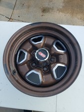  Oldsmobile Cutlass Rally Wheel 14x7 W/Bolt-On Center Cap  picture