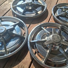 Original 1963 corvette Stingray C2 wheel cover and spinner hub assembly OEM picture