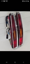 NOS RARE 1980 -  1990  CADILLAC FLEETWOOD  & DEVILLE REAR TAILIGHTS EXPORT STYLE picture