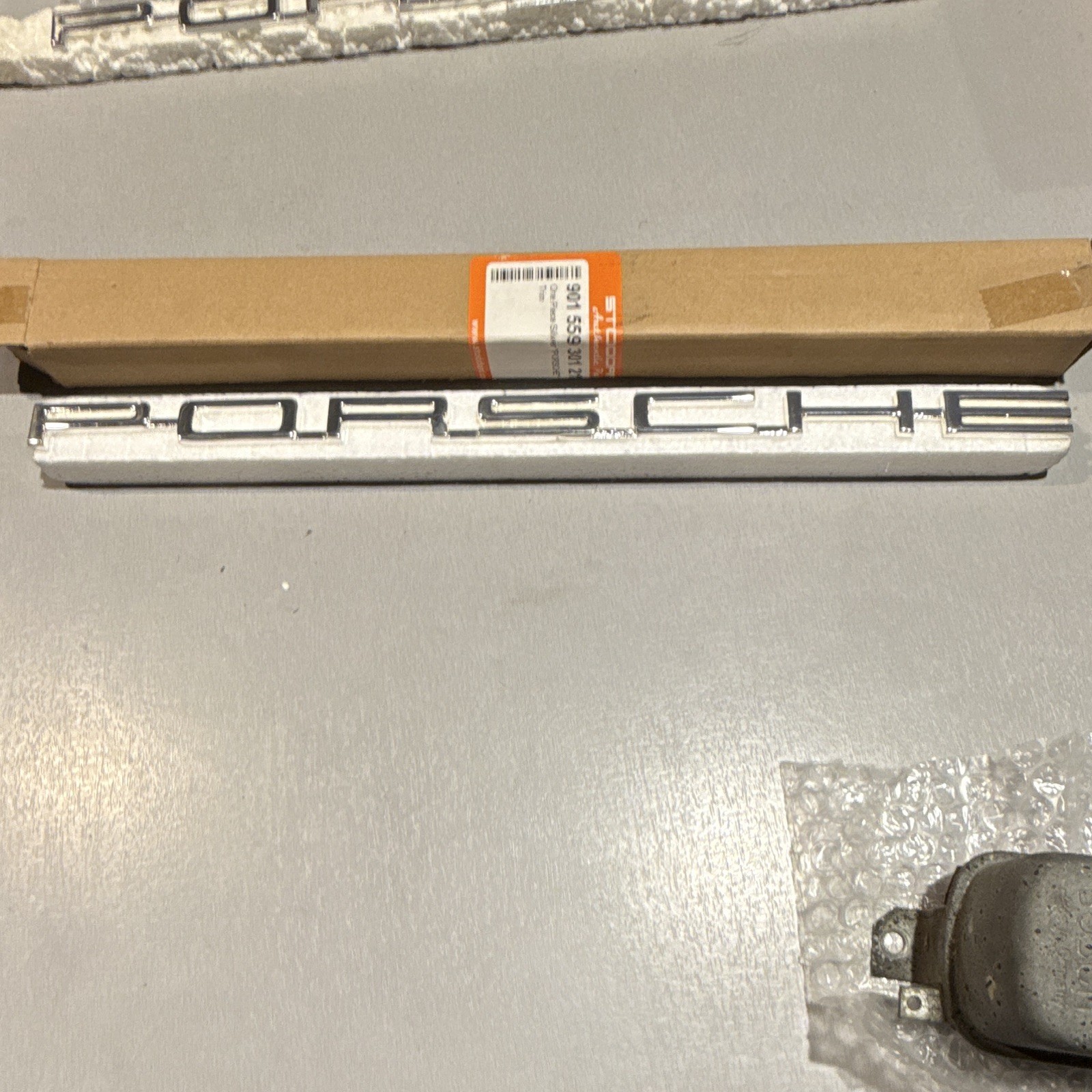 Porsche Decklid Logo Silver 911/912 65-69 901-559-301-21 NEW 901.559.301.21 Porsche Decklid Logo Silver 911/912 65-69 901-559-301-21 NEW 901.559.301.21