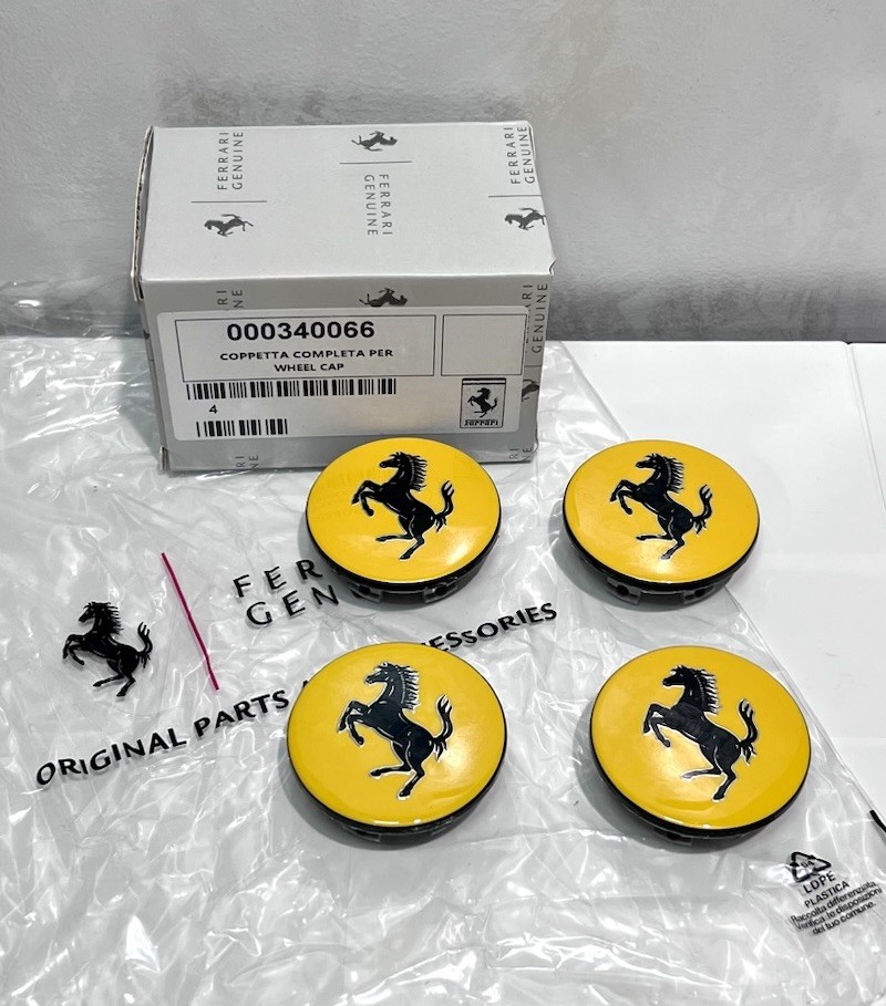4 Pcs Ferrari Genuine Yellow Wheel Center Cap Set OEM - 340066 4 Pcs Ferrari Genuine Yellow Wheel Center Cap Set OEM - 340066