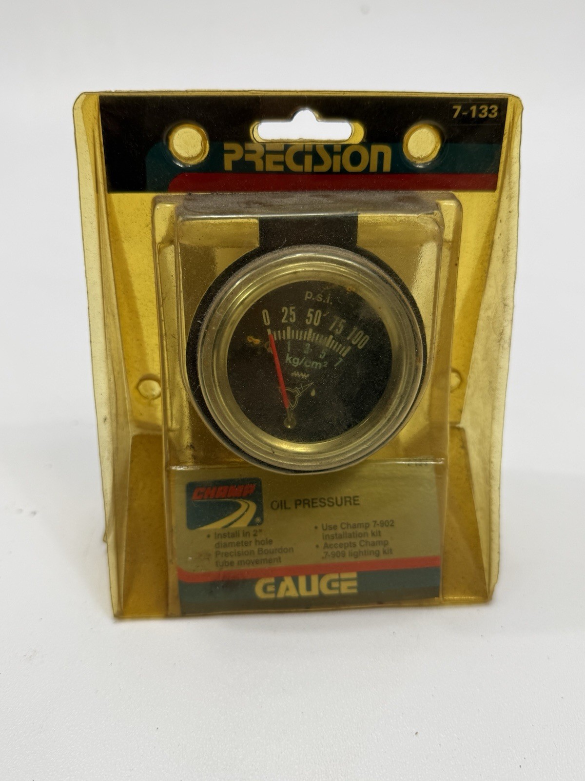This is a vintage Champ Precision mechanical oil-pressure gauge, part #7-133