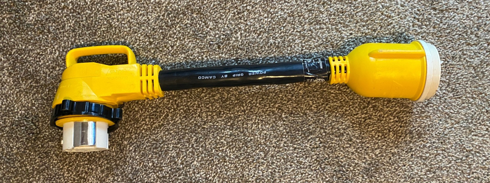 Camco 55572 18 50 AMP Locking Male/50 AMP Locking 90 Degree Female PowerGrip Camco 55572 18 50 AMP Locking Male/50 AMP Locking 90 Degree Female PowerGrip