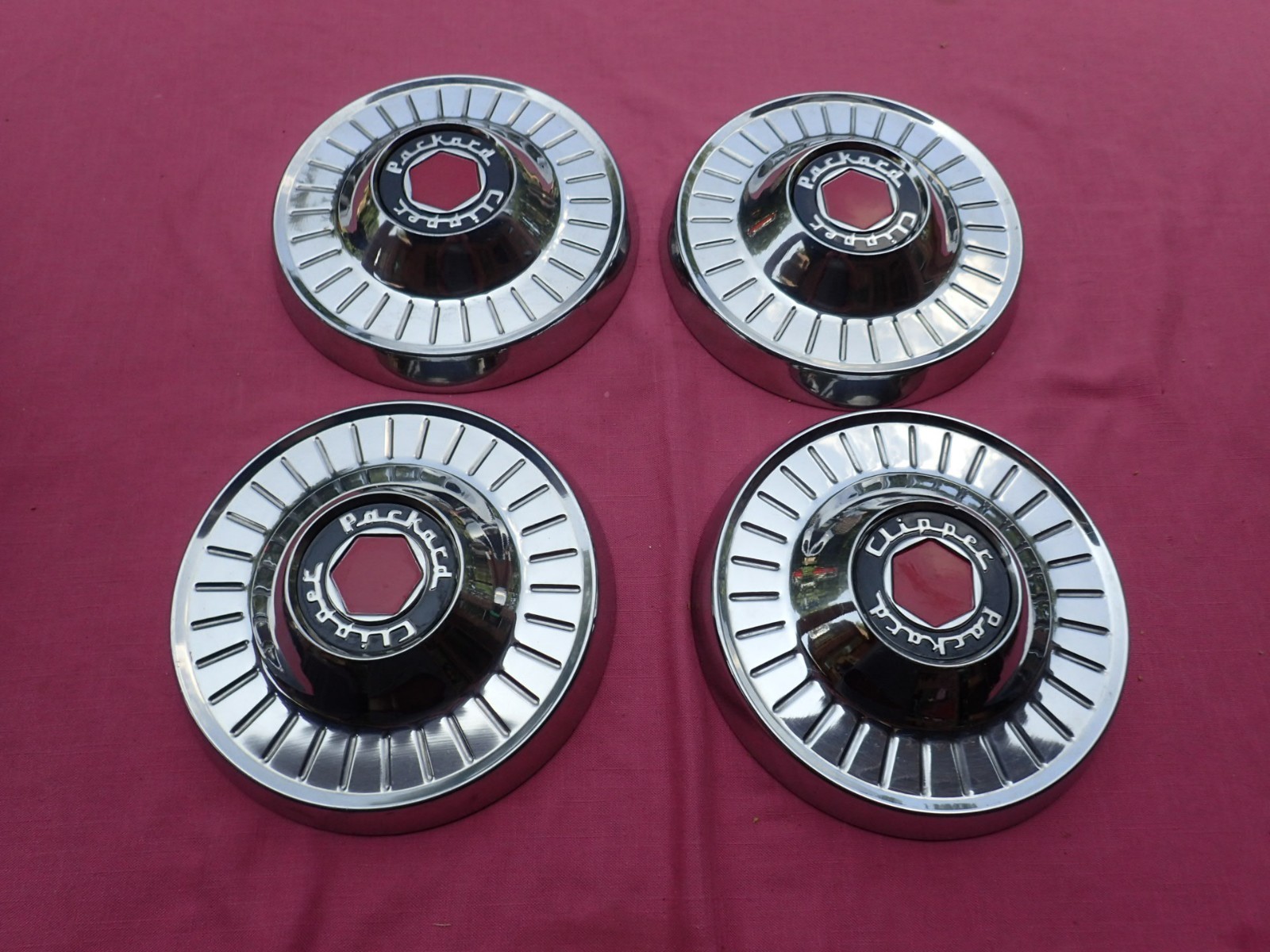 1950’s Packard Clipper 10” hub caps, set of 4, NOS wheel covers