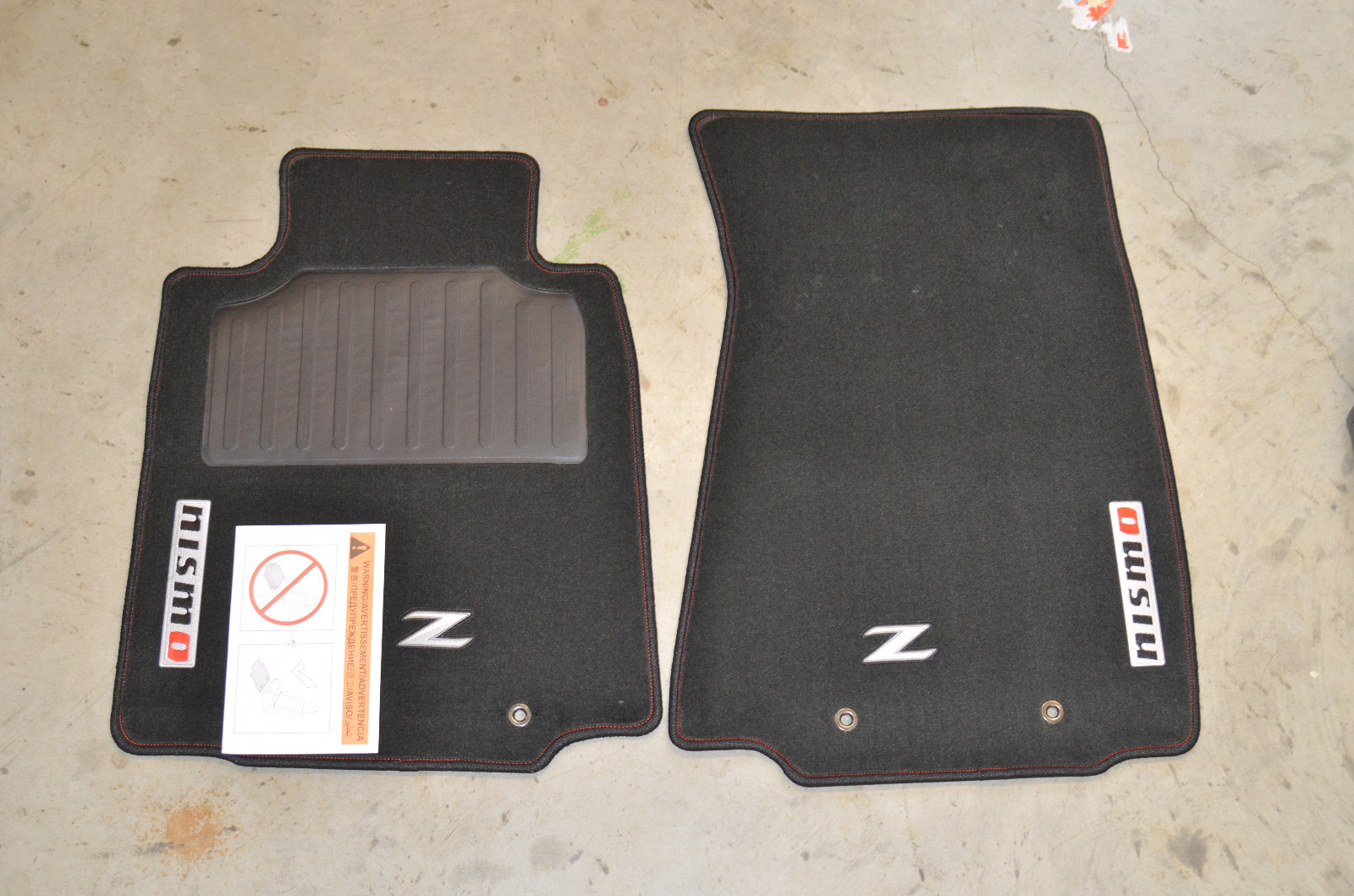 NEW Genuine OEM 2009-2017 Nissan NISMO Carpeted Floor Mats (2-pc) 999E2-ZV011 NEW Genuine OEM 2009-2017 Nissan NISMO Carpeted Floor Mats (2-pc) 999E2-ZV011