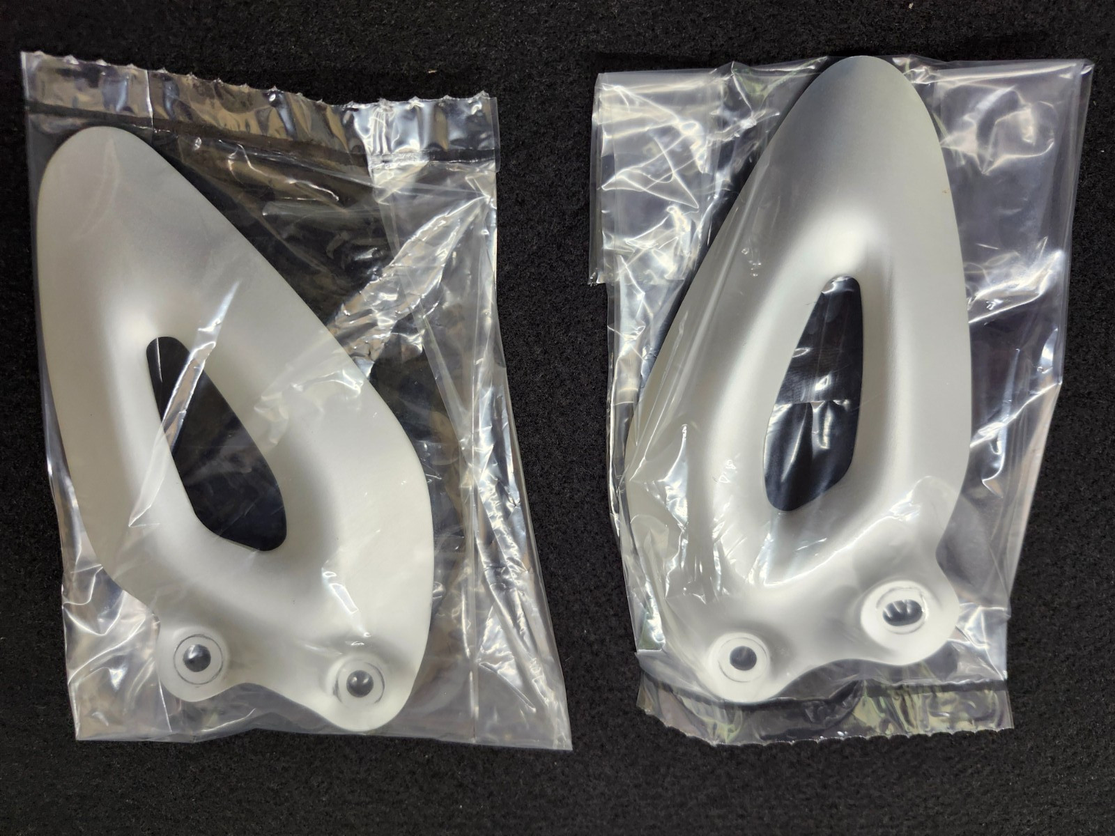 New 20-26 OEM Triumph Rocket 3 Heel Guard Protector L & R Set T2082826, T2082827 New 20-26 OEM Triumph Rocket 3 Heel Guard Protector L & R Set T2082826, T2082827