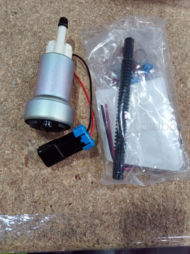 Opened box F90000274 WALBRO 450LPH High Pressure Fuel Pump + QFS Install Kit E85