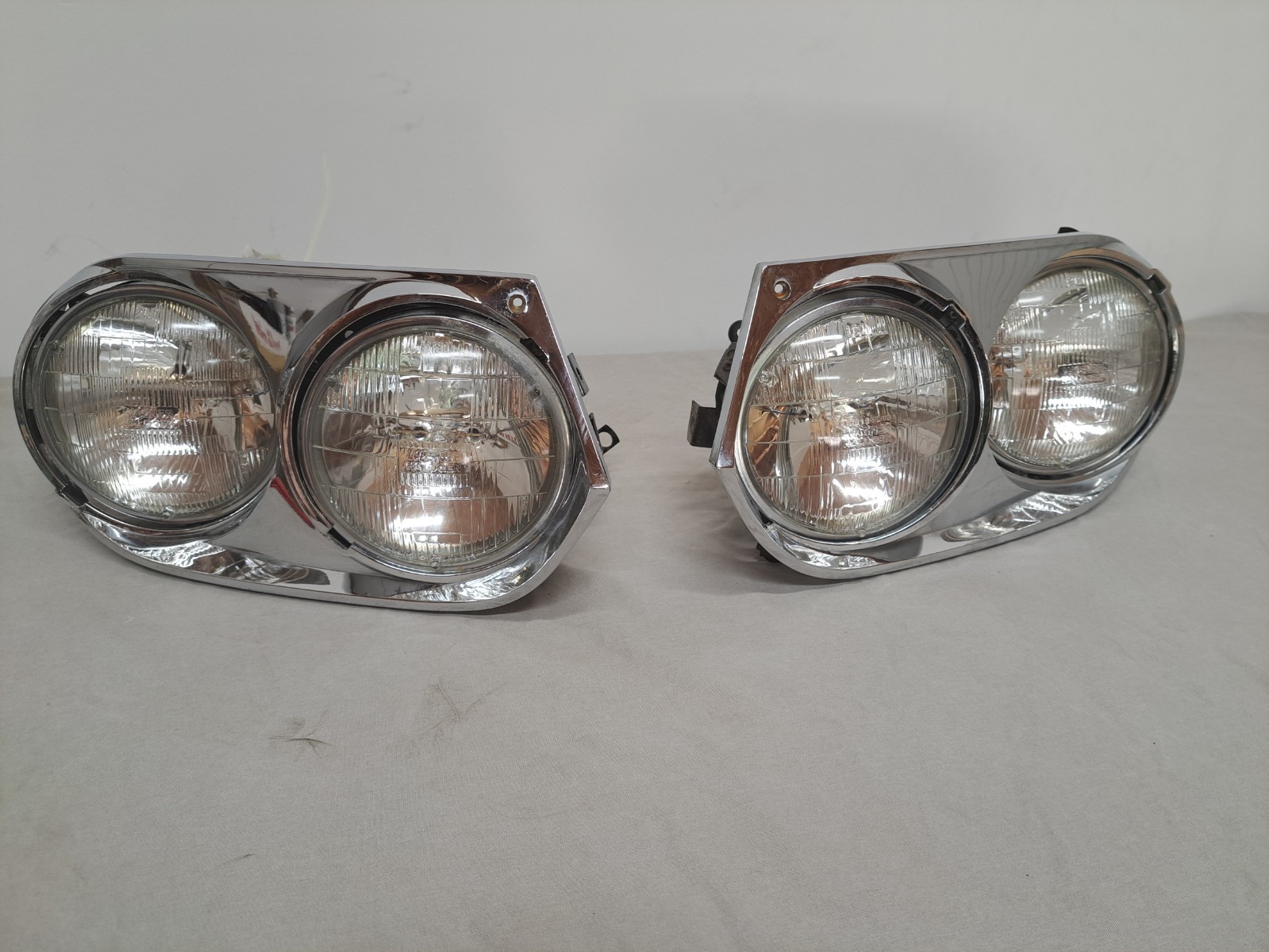 1976-1991 Jaguar XJS OEM QUAD Headlight Assembly + Chrome Bezel 1976-1991 Jaguar XJS OEM QUAD Headlight Assembly + Chrome Bezel