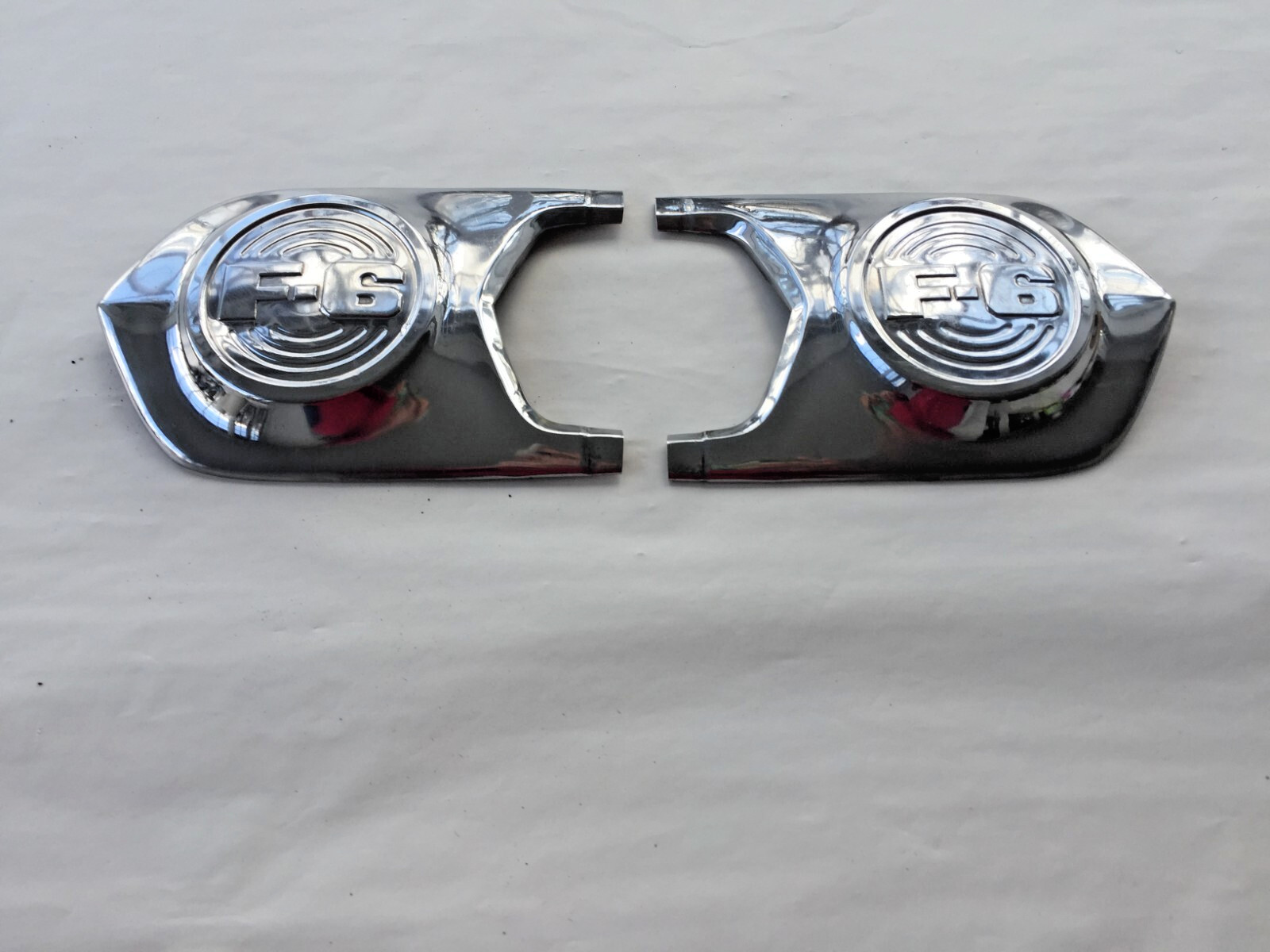 1952 FORD F6 DELUXE TRUCK HOOD SIDE EMBLEMS PAIR WITH MOUNTING PLATES FOMOCO OEM 1952 FORD F6 DELUXE TRUCK HOOD SIDE EMBLEMS PAIR WITH MOUNTING PLATES FOMOCO OEM