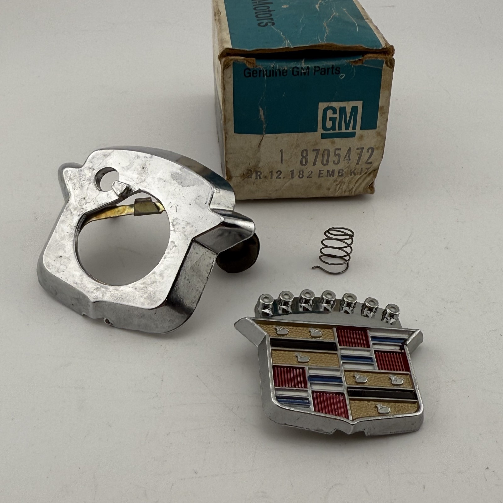 NOS OEM GM 1971-1978 Cadillac Eldorado TRUNK LOCK COVER 8705472 9833483