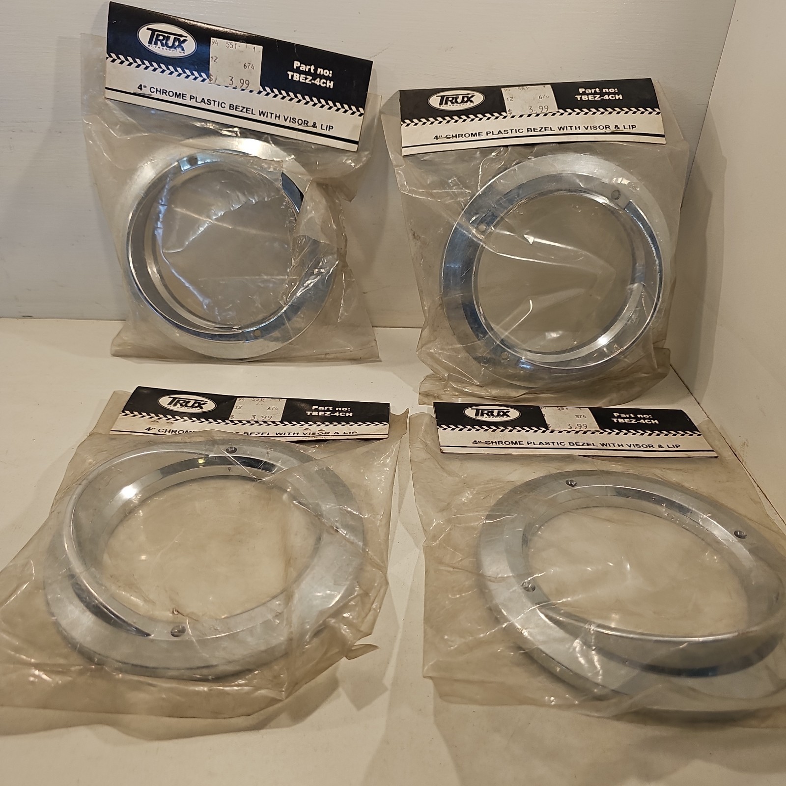 NEW LOT OF 4 TRUX Chrome Plastic Twist-On Bezel 4