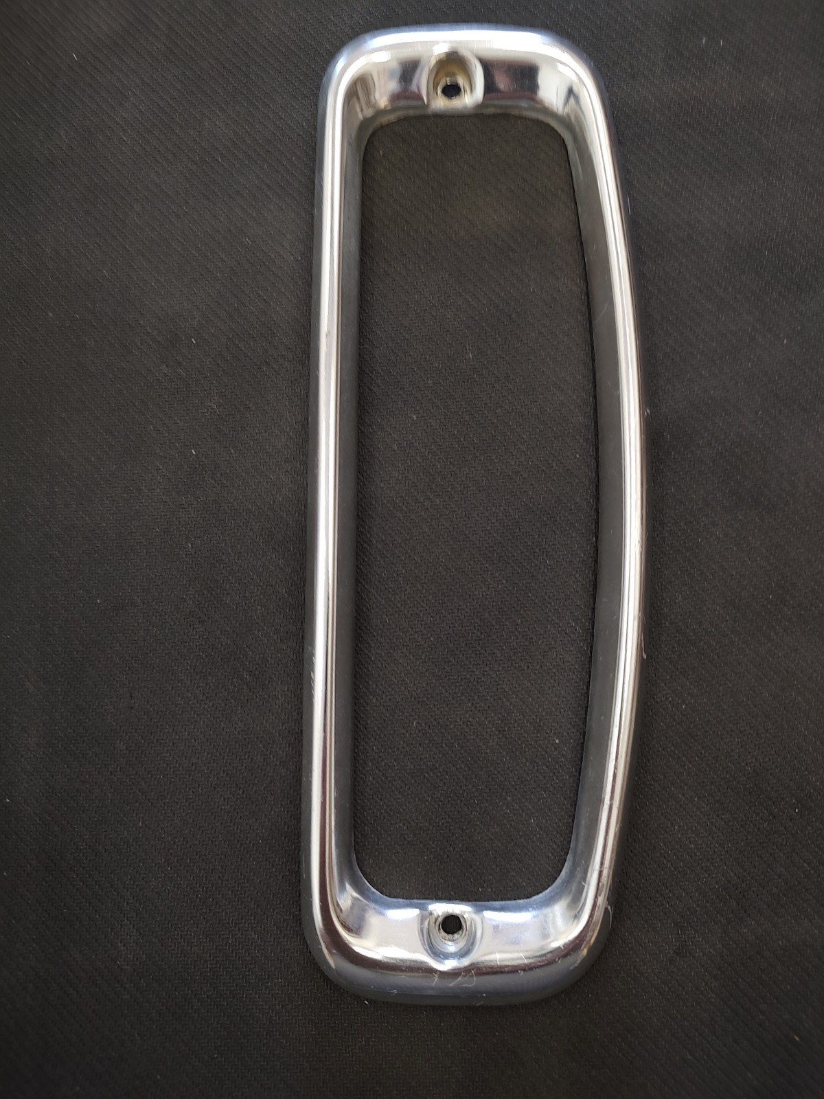 1966-1977 FORD EARLY BRONCO REAR TAIL LIGHT BEZEL - PASSENGER SIDE 1966-1977 FORD EARLY BRONCO REAR TAIL LIGHT BEZEL - PASSENGER SIDE