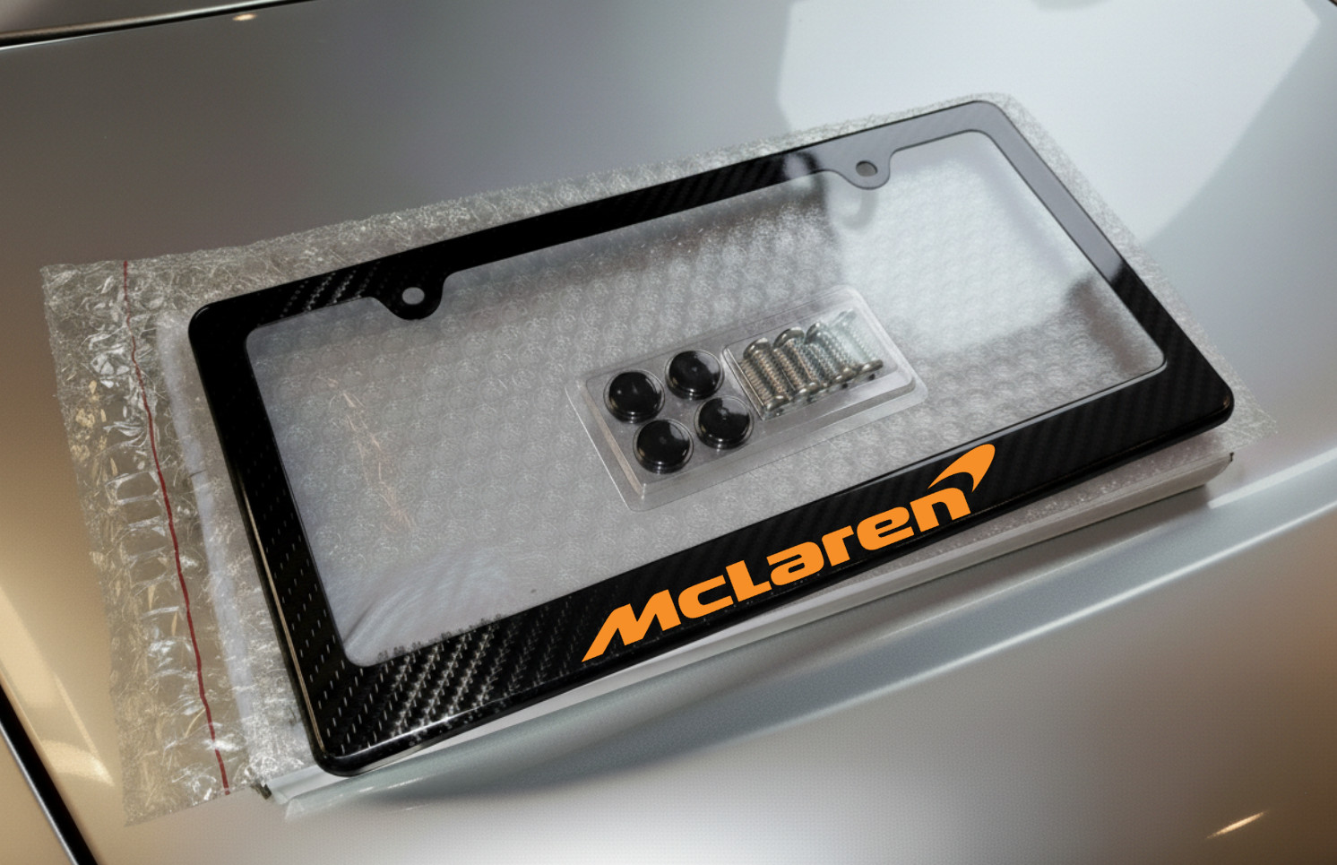 Orange McLaren License Plate Frame Racing Style 100% Carbon Fiber Orange McLaren License Plate Frame Racing Style 100% Carbon Fiber