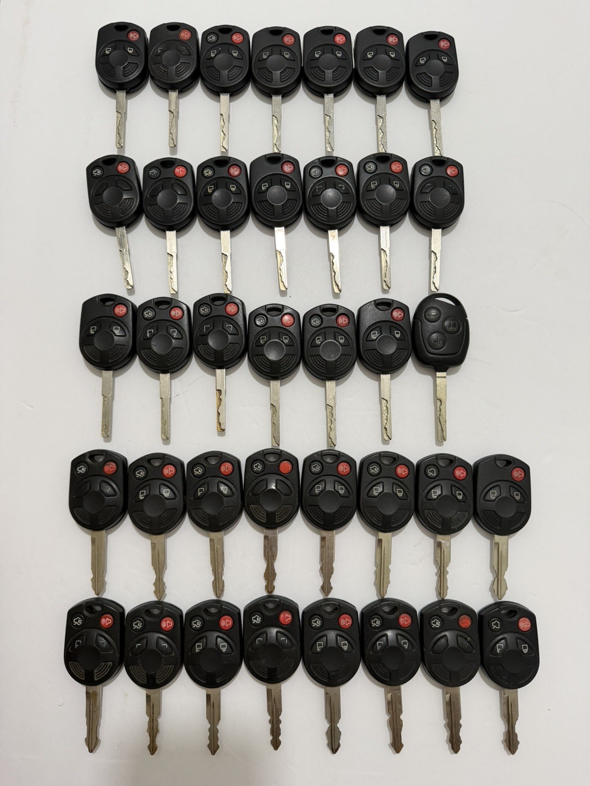 LOT OF 37 OEM FORD OEM HEAD KEY LESS ENTRY REMOTE FOB LOT OF 37 OEM FORD OEM HEAD KEY LESS ENTRY REMOTE FOB