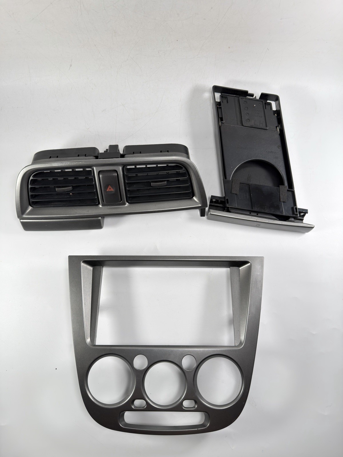 2002-2004 Subaru Impreza WRX Dash Radio Bezel Air Vents Cup Holder Panel Set OEM 2002-2004 Subaru Impreza WRX Dash Radio Bezel Air Vents Cup Holder Panel Set OEM
