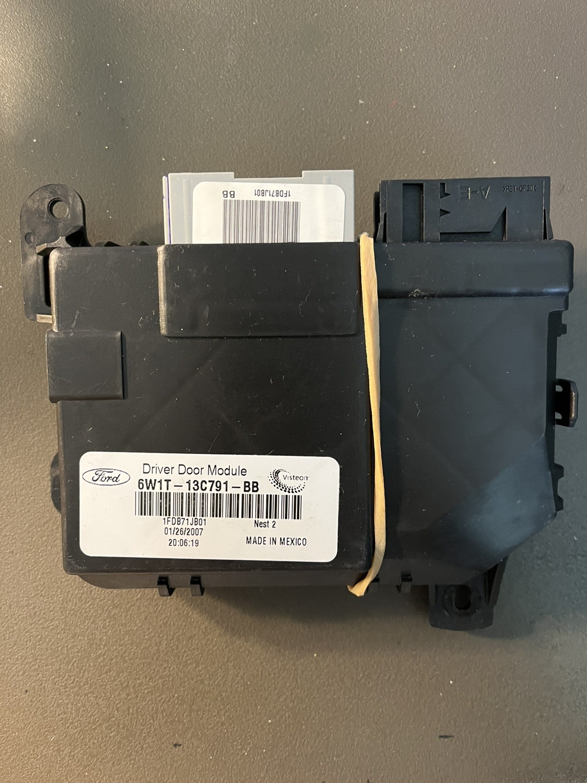 2006-2008 Lincoln Town Car OEM Driver Door Module-May Have Code