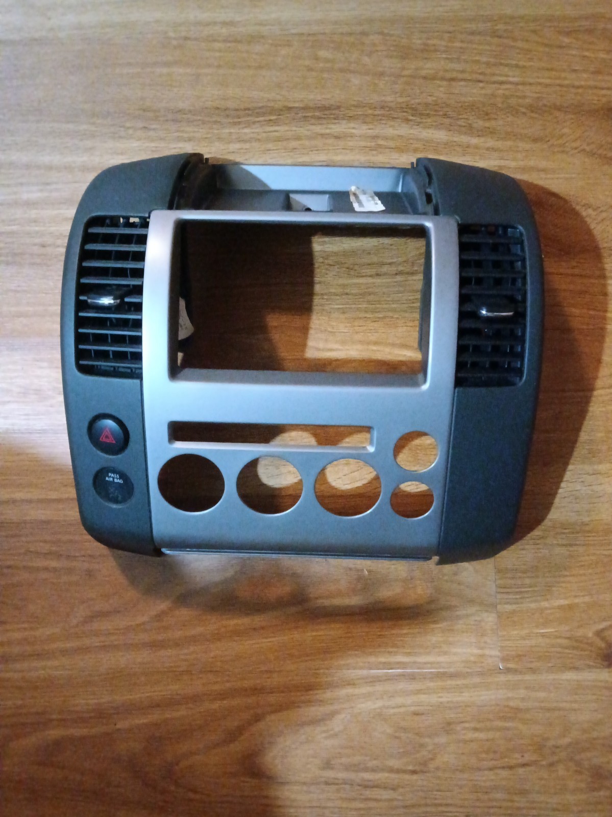 2005-2007 Nissan Pathfinder center dash radio-climate control trim bezel & vents 2005-2007 Nissan Pathfinder center dash radio-climate control trim bezel & vents