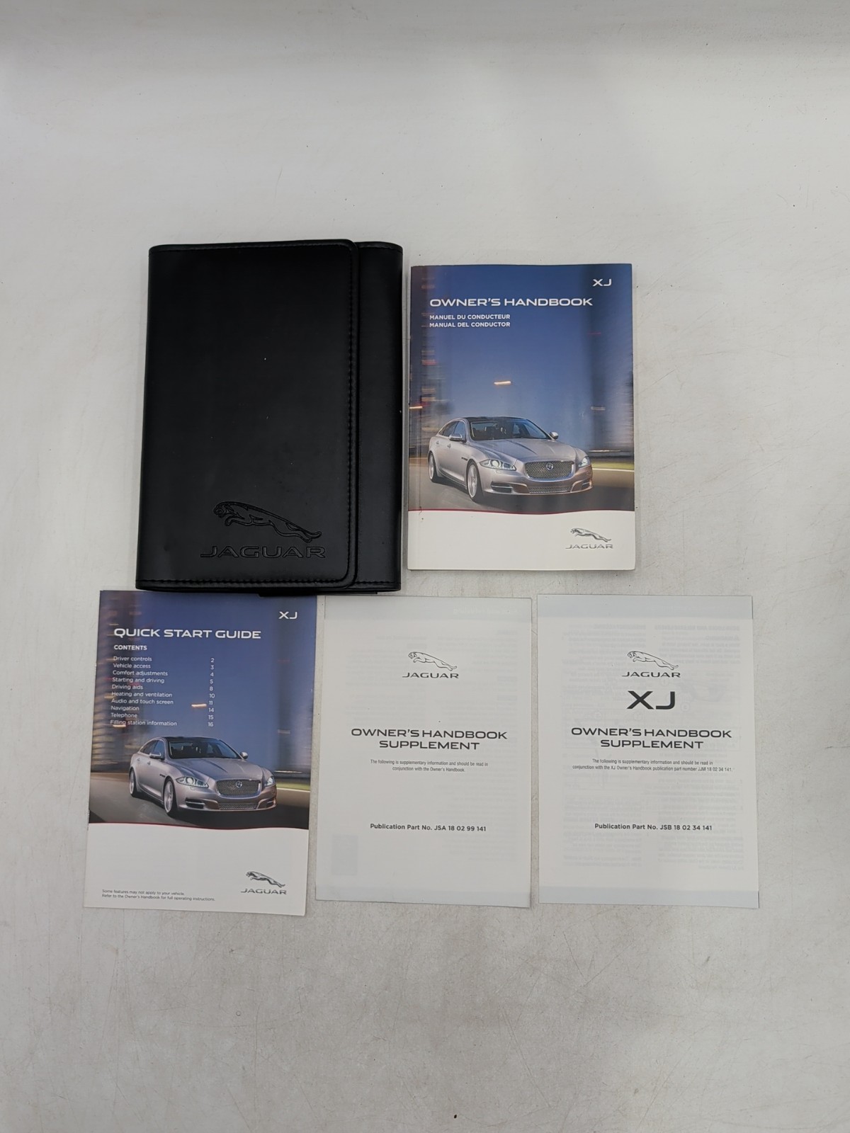 2014 Jaguar XJ Owner's Manual Base, Portfolio, Supercharged, and XJR w/ Case 2014 Jaguar XJ Owner's Manual Base, Portfolio, Supercharged, and XJR w/ Case