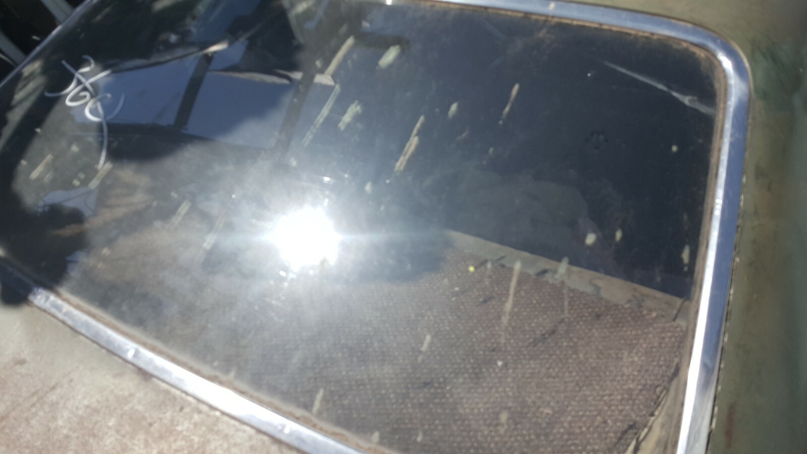 68 1968 Pontiac Catalina 4 door back glass clear no tint WITH MOLDINGS 