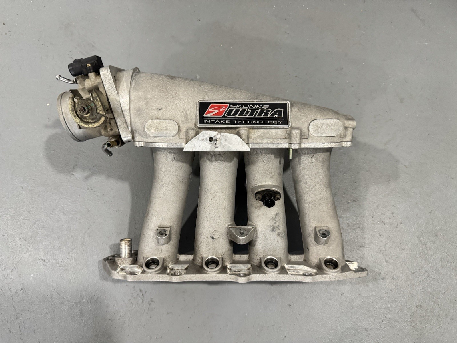 Skunk2 B-Series Ultra Series Street Intake Manifold B16A B17A B18C B18C1 B18C5 Skunk2 B-Series Ultra Series Street Intake Manifold B16A B17A B18C B18C1 B18C5