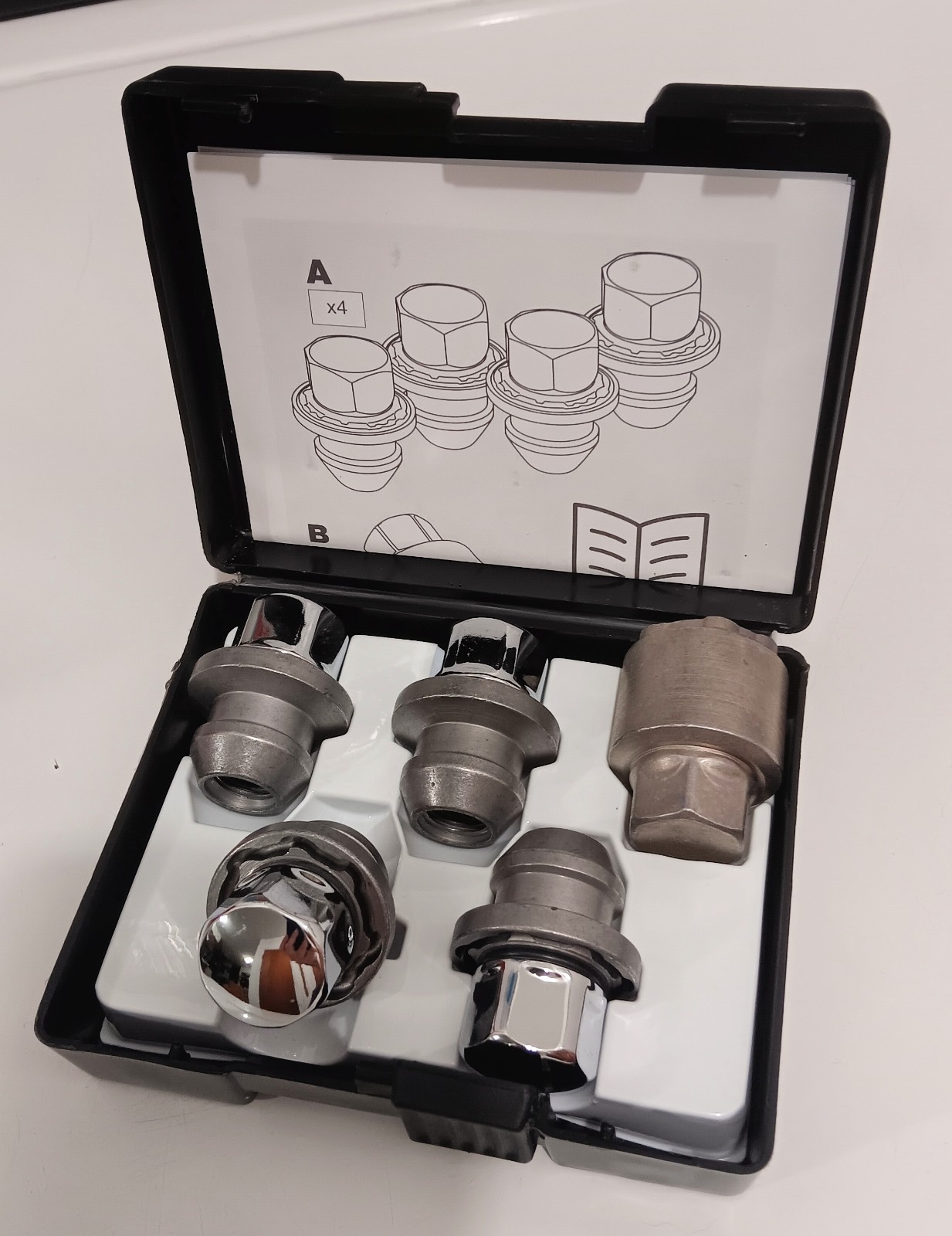 New In Package GM Chrome Wheel Locks 86525831 - 83XX Key Codes