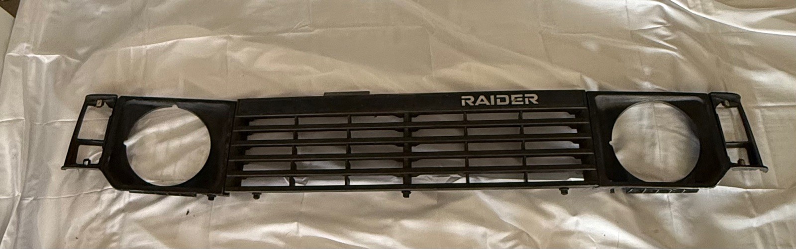 1983-1991 Dodge Raider Montero, Pajero, OEM Front Grill lamp bezel housing trim 