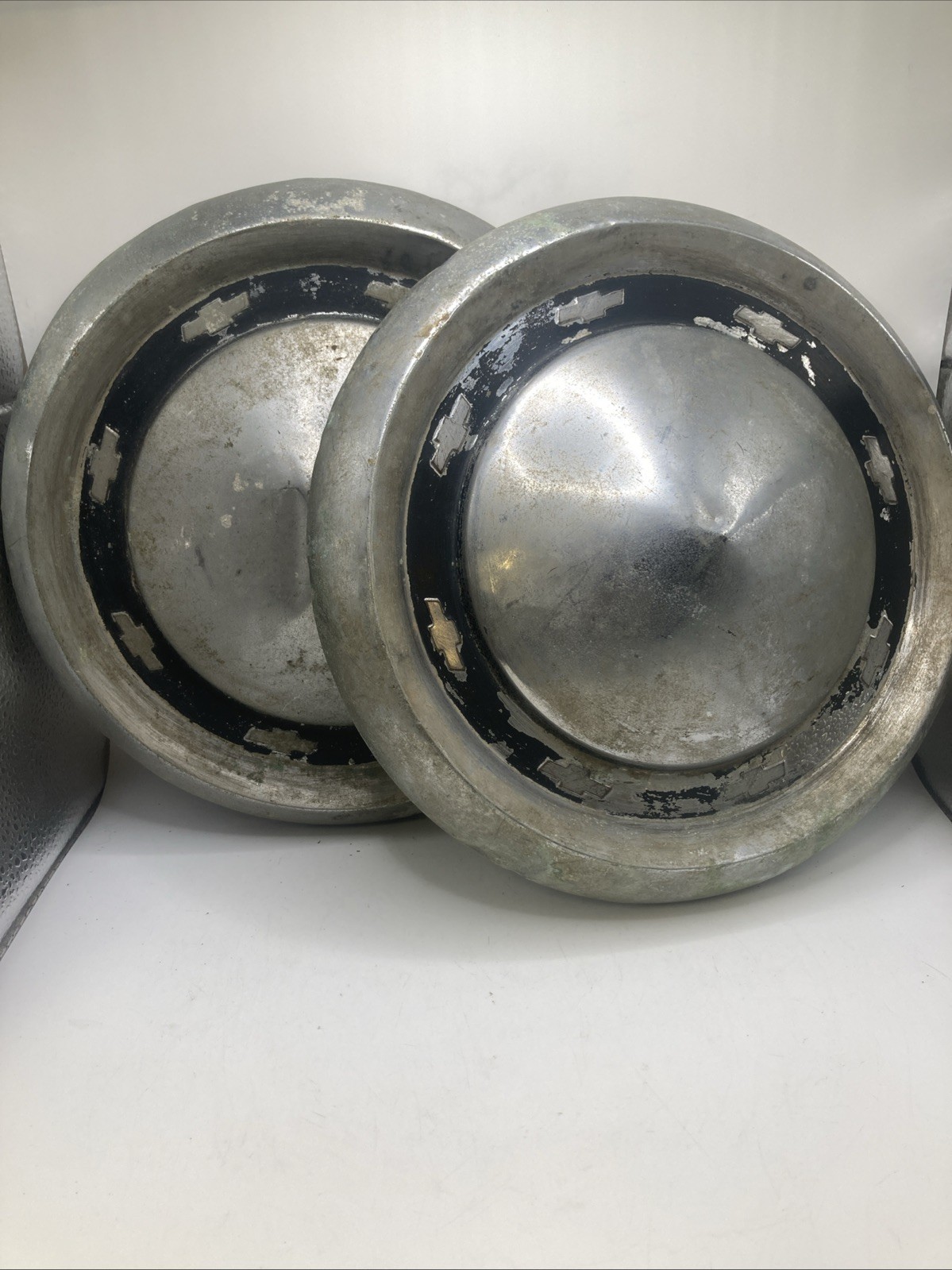 2 Antique 1950s Chevy Hubcaps Chrome With Black Trim 10.5” Relatively good Cond. 2 Antique 1950s Chevy Hubcaps Chrome With Black Trim 10.5” Relatively good Cond.