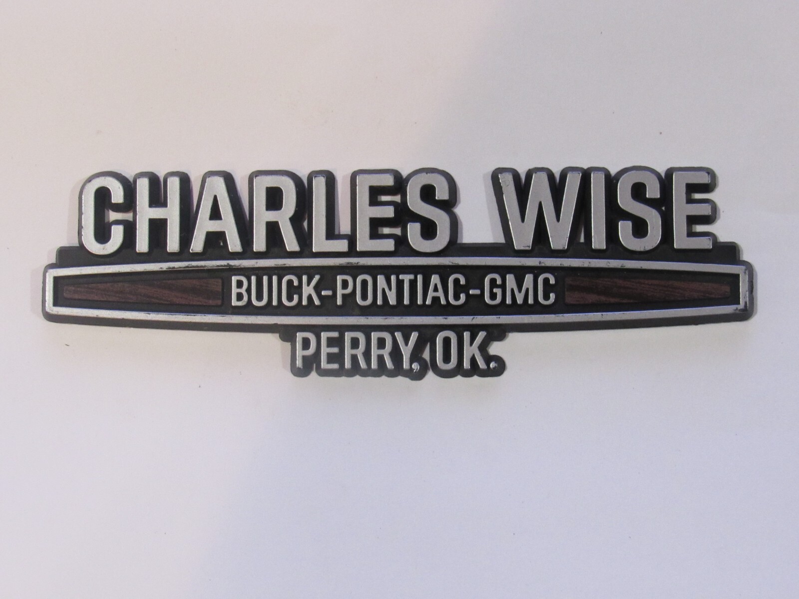 Vintage Charles Wise Pontiac Perry Oklahoma Plastic Dealer Badge Emblem Tag OK