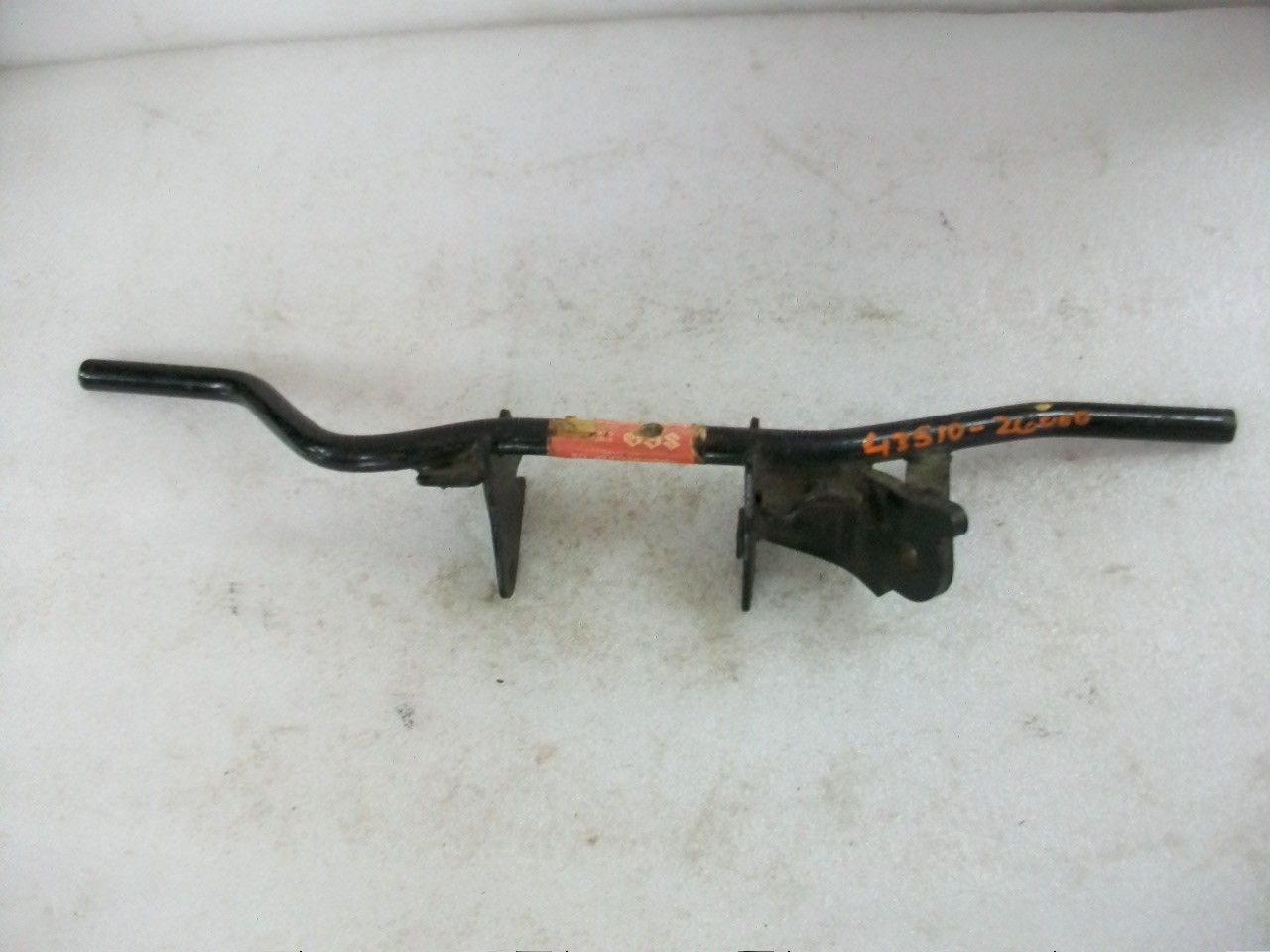NOS 1971-1974 Suzuki TS50 Guacho TS 50 Foot Peg Bracket Kickstand Bar Footrest NOS 1971-1974 Suzuki TS50 Guacho TS 50 Foot Peg Bracket Kickstand Bar Footrest