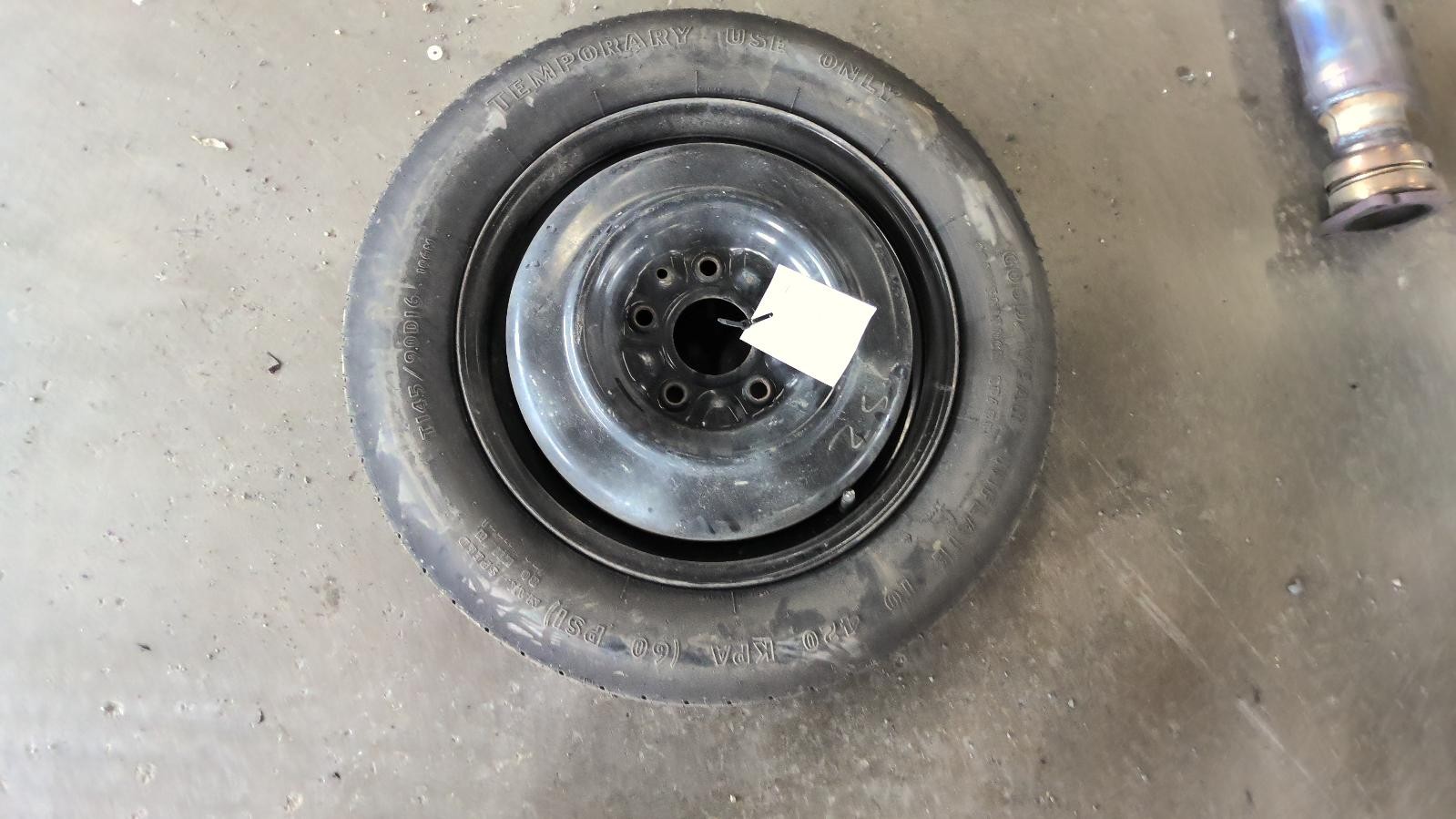 Used Spare Tire Wheel fits: 2009 Dodge Caravan 16x4 compact spare Spare Tire Gra