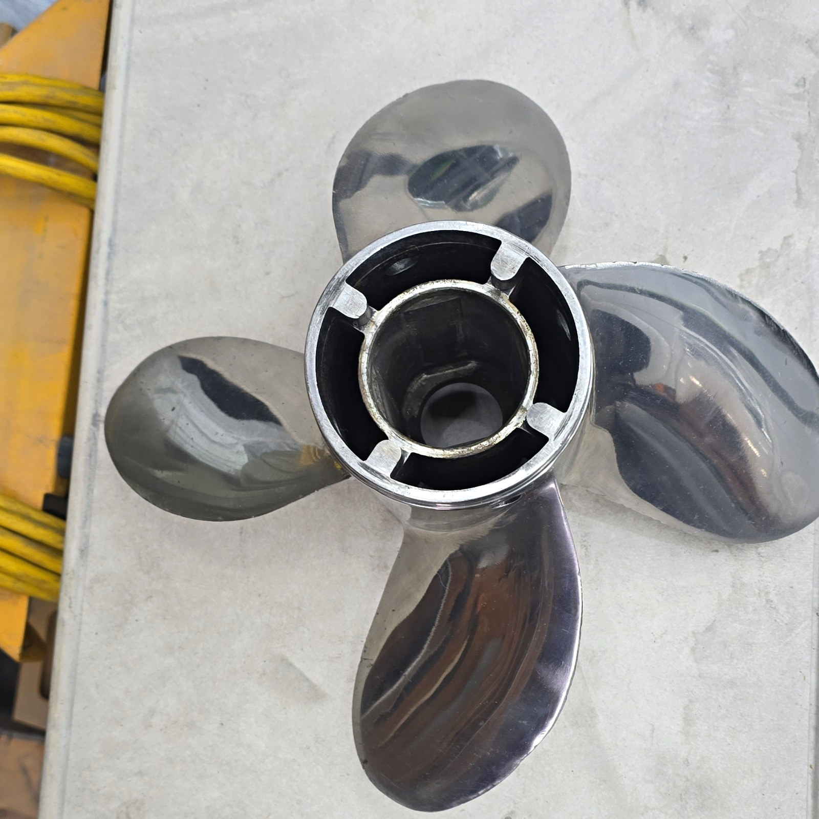 Mercury Trophy Plus 4-blade stainless steel propeller with a 23-inch pitch