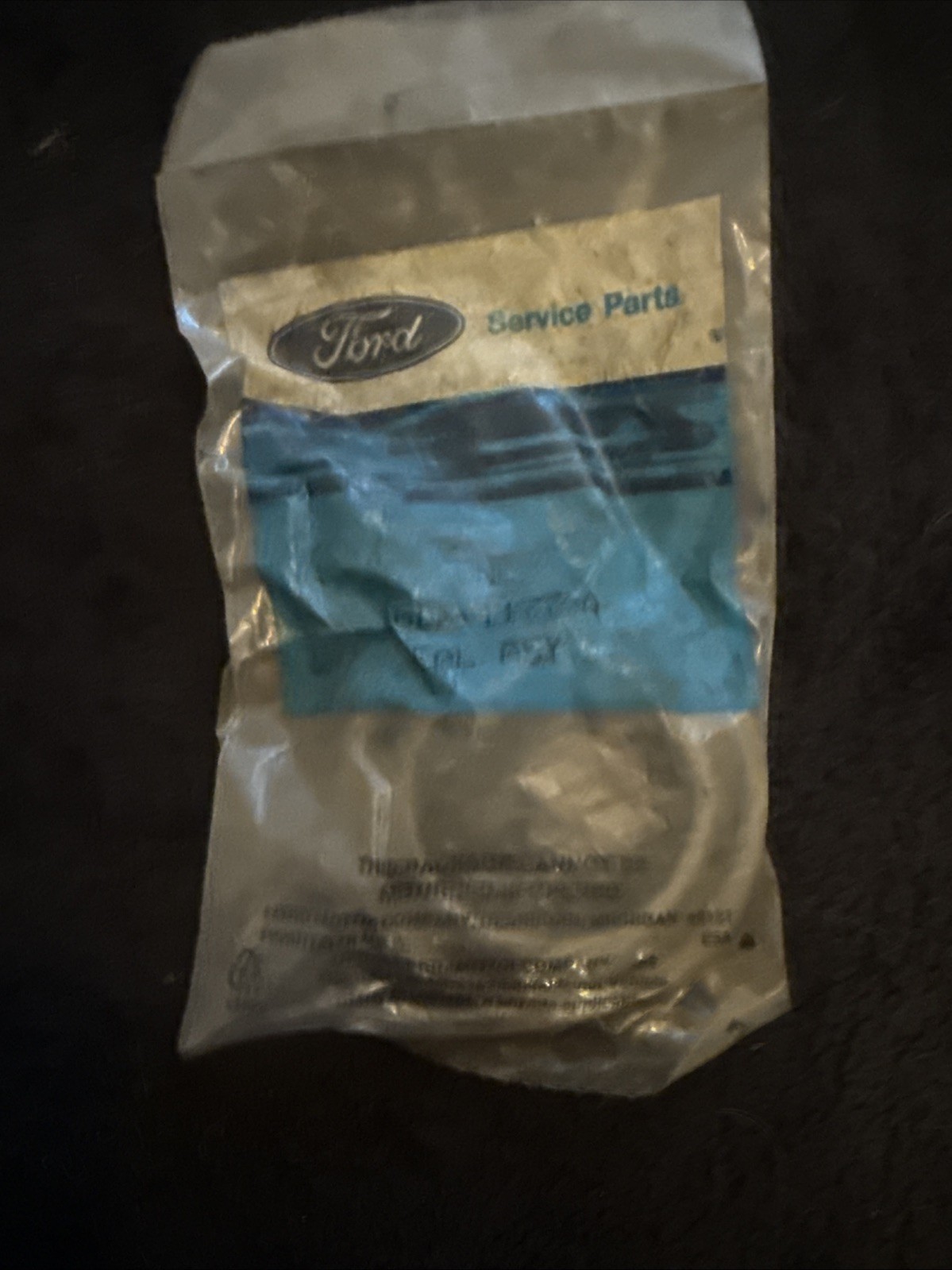 a vintage New Old Stock (NOS) Ford wheel bearing or axle oil seal assembly