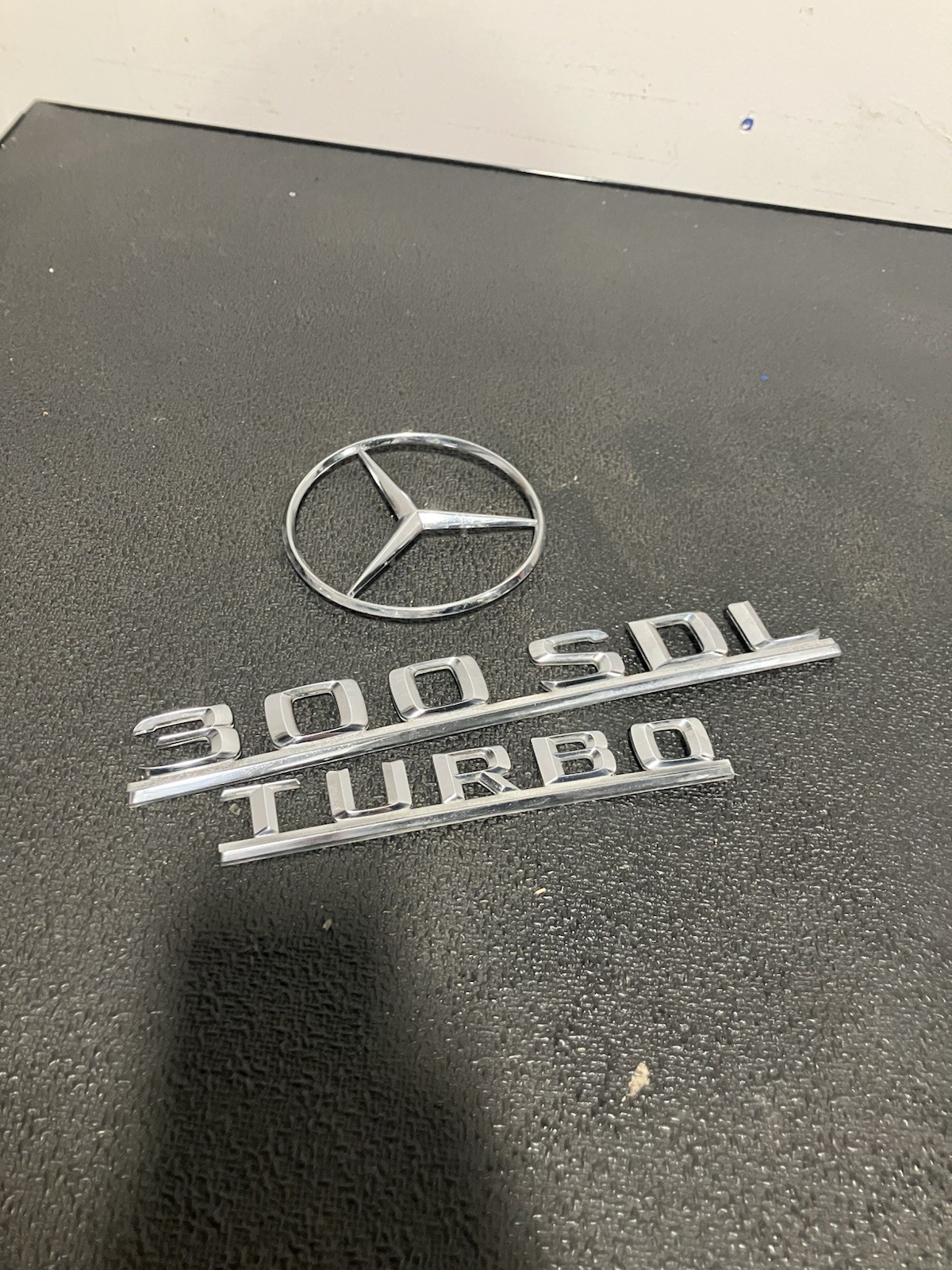 1986-1987 Mercedes-Benz 300sdl complete trunk badging 1986-1987 Mercedes-Benz 300sdl complete trunk badging