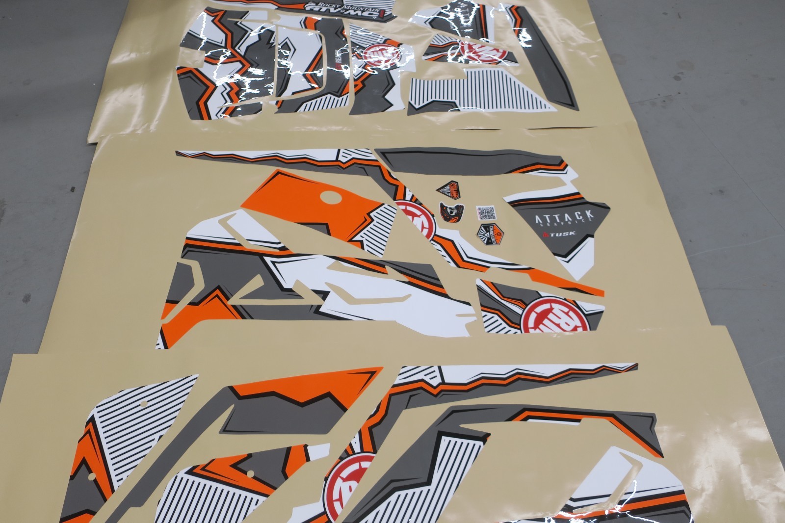 Attack Graphics QUAKE Complete UTV Graphics Base Kit Orange/Dark Grey/White. Attack Graphics QUAKE Complete UTV Graphics Base Kit Orange/Dark Grey/White.