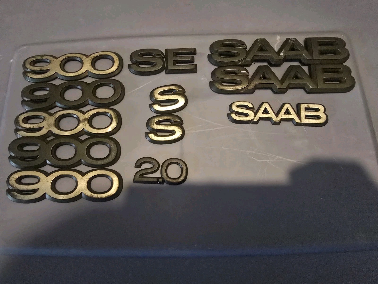 Saab 900 SE OEM rear trunk Fender plastic black Genuine Emblems 12 Total Saab 900 SE OEM rear trunk Fender plastic black Genuine Emblems 12 Total