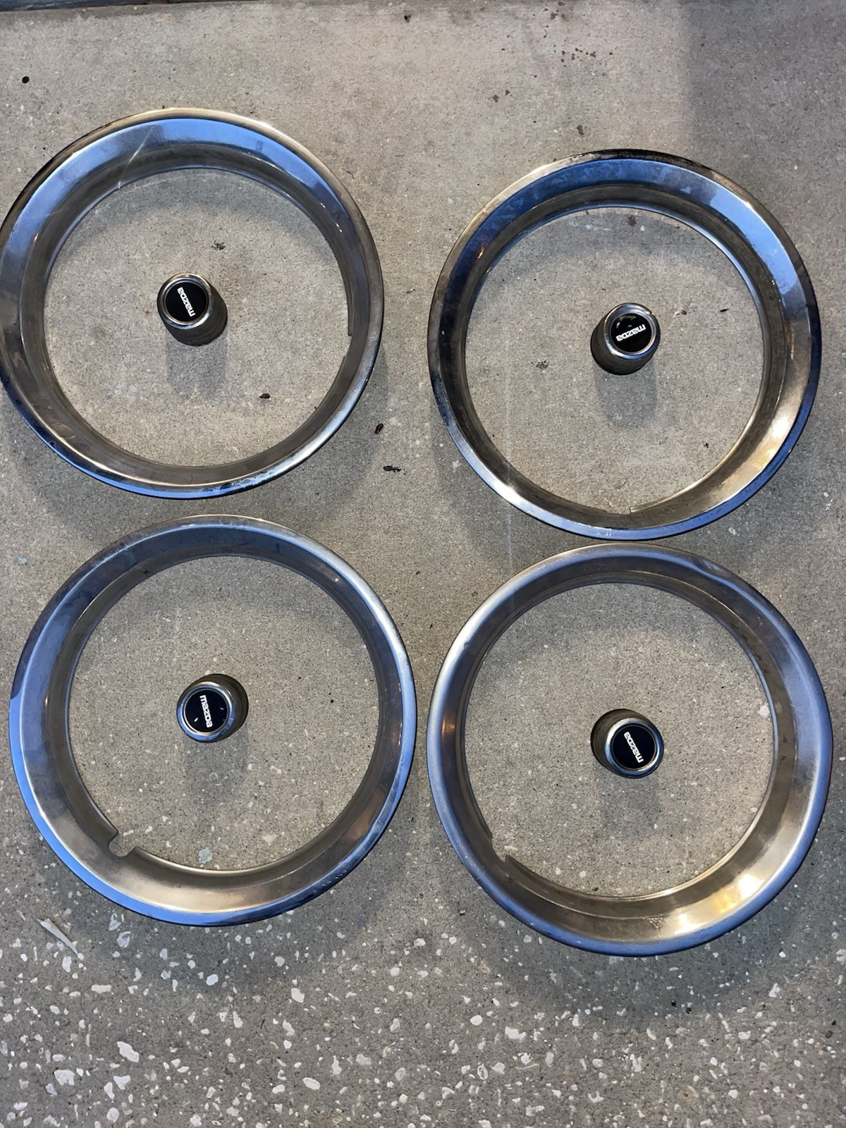 1976 MAZDA Rx3-808 Center Caps And Wheel Rings 1976 MAZDA Rx3-808 Center Caps And Wheel Rings