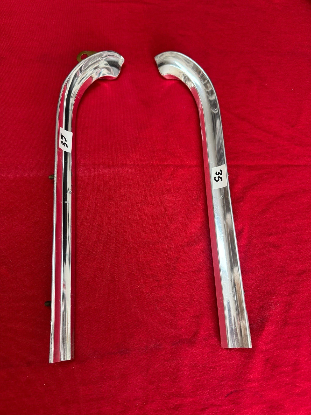 OEM 1966 Chevrolet IMPALA BELAIR LOWE GRILLE EXTENSION MOLDING PAIR OEM 1966 Chevrolet IMPALA BELAIR LOWE GRILLE EXTENSION MOLDING PAIR