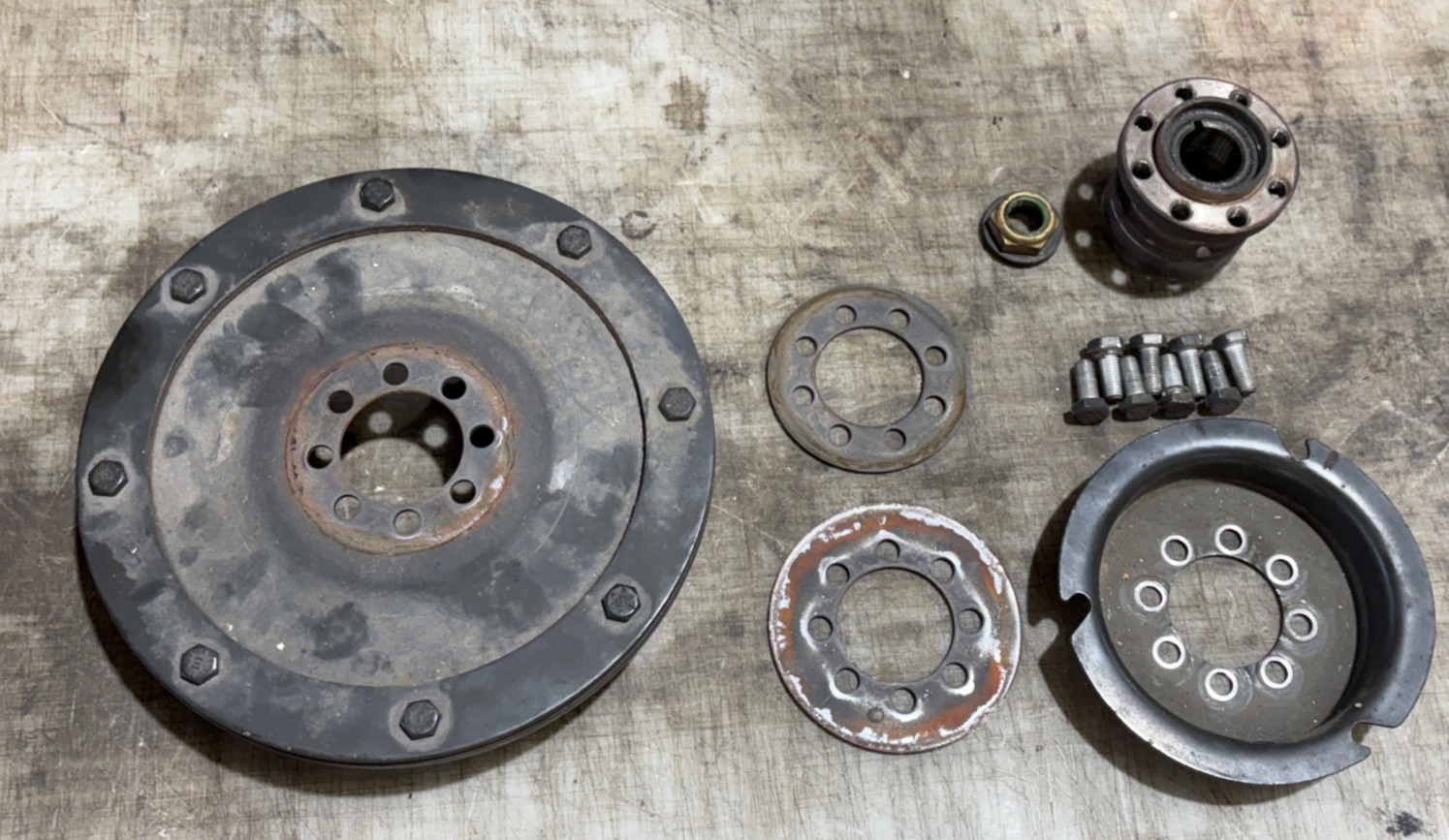 1986 Mercury 35 Hp 40463R Model 2 cylinder flywheel, mounting bolts hardware