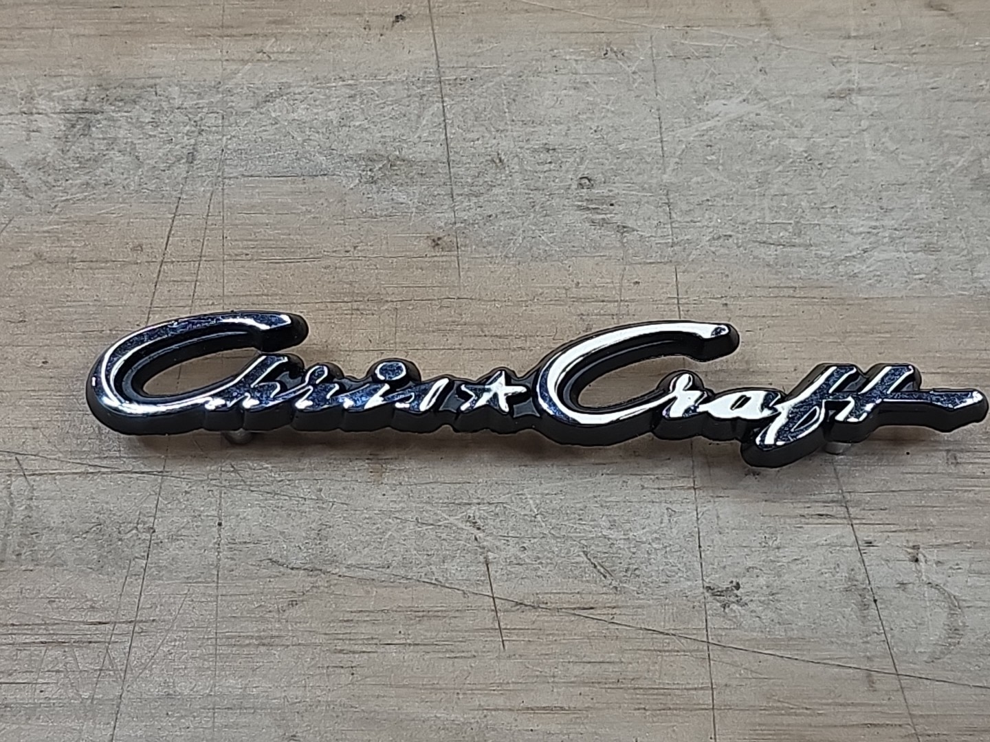 Vtg CHRIS CRAFT CURSIVE NAMEPLATE. NOS Chrome With Black Background pin Vtg CHRIS CRAFT CURSIVE NAMEPLATE. NOS Chrome With Black Background pin