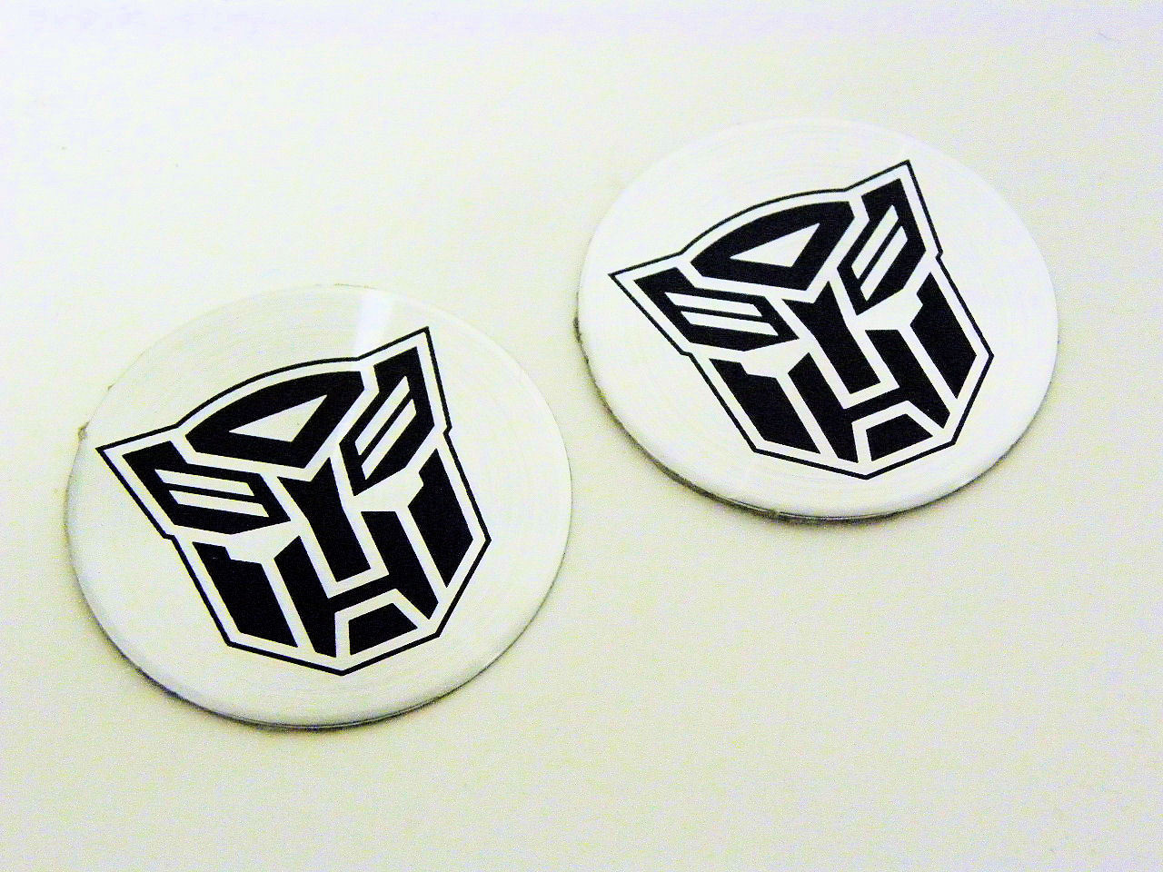 2 TRANSFORMERS AUTOBOTS HARLEY DAVIDSON CAR TRUCK SUV UNIVERSAL OIL CAP EMBLEMS 2 TRANSFORMERS AUTOBOTS HARLEY DAVIDSON CAR TRUCK SUV UNIVERSAL OIL CAP EMBLEMS