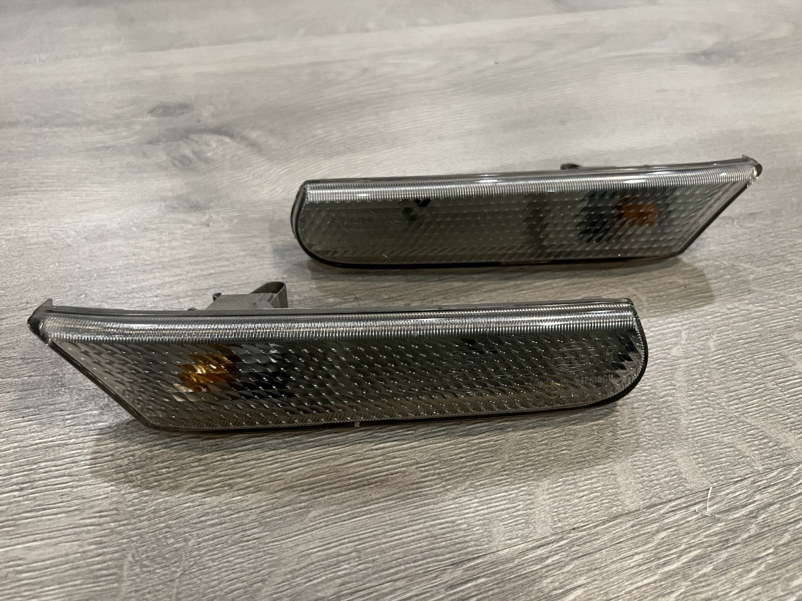 Porsche 911 996.631.044.01 Smoked Hella Side Marker Lights Pair OEM Euro Porsche 911 996.631.044.01 Smoked Hella Side Marker Lights Pair OEM Euro