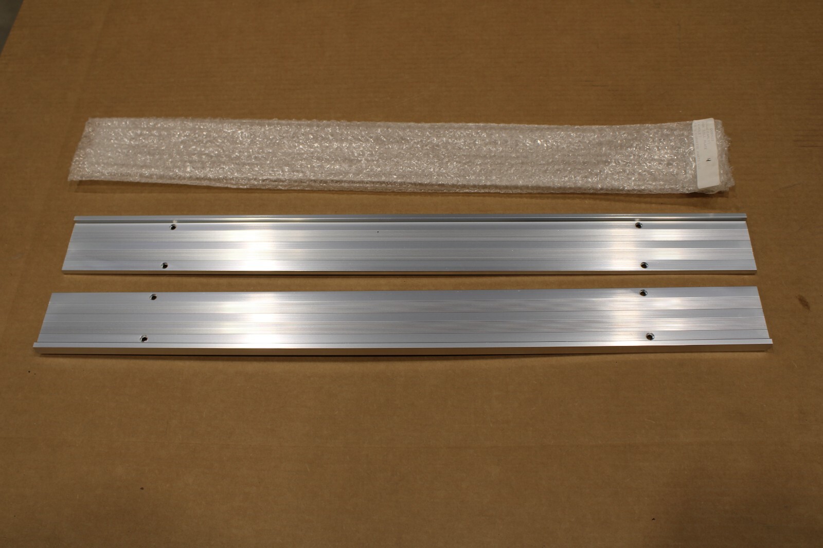 1963 - Early 1964 Corvette Aluminum Door Sill Plates Pair 4-hole 1963 - Early 1964 Corvette Aluminum Door Sill Plates Pair 4-hole