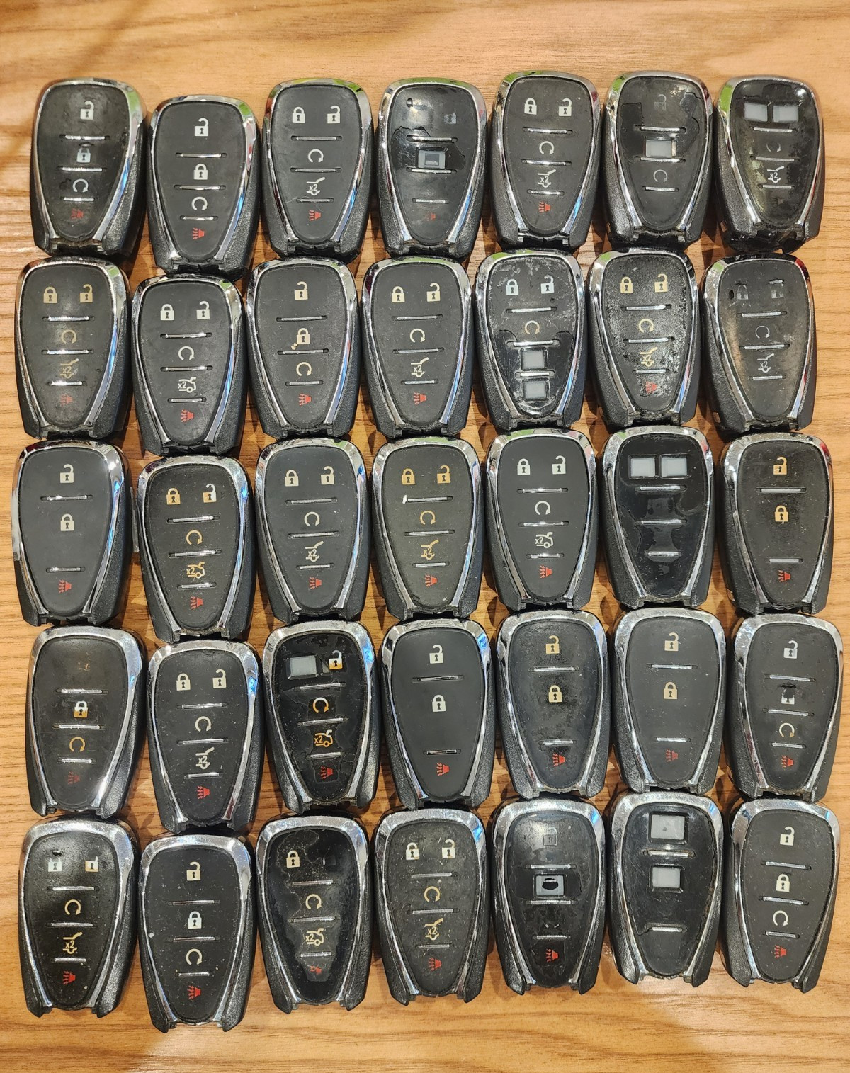 LOT OF 35 CHEVROLET CHEVY SMART KEYS REMOTES FOBS OEM USED LOCKSMITH WORN