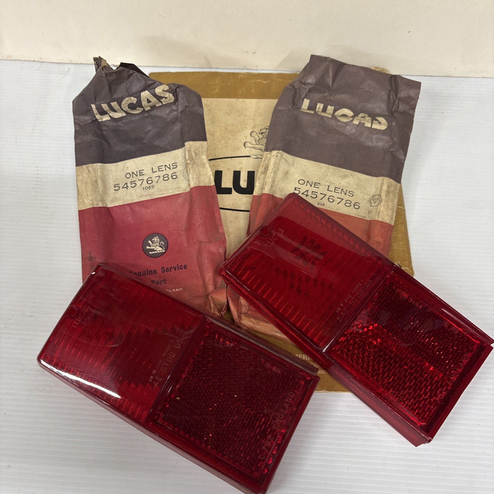 Aston Martin DBS Lotus 7 Series IV NOS Lucas Red Tail Light Lens Set 1971-72 Aston Martin DBS Lotus 7 Series IV NOS Lucas Red Tail Light Lens Set 1971-72