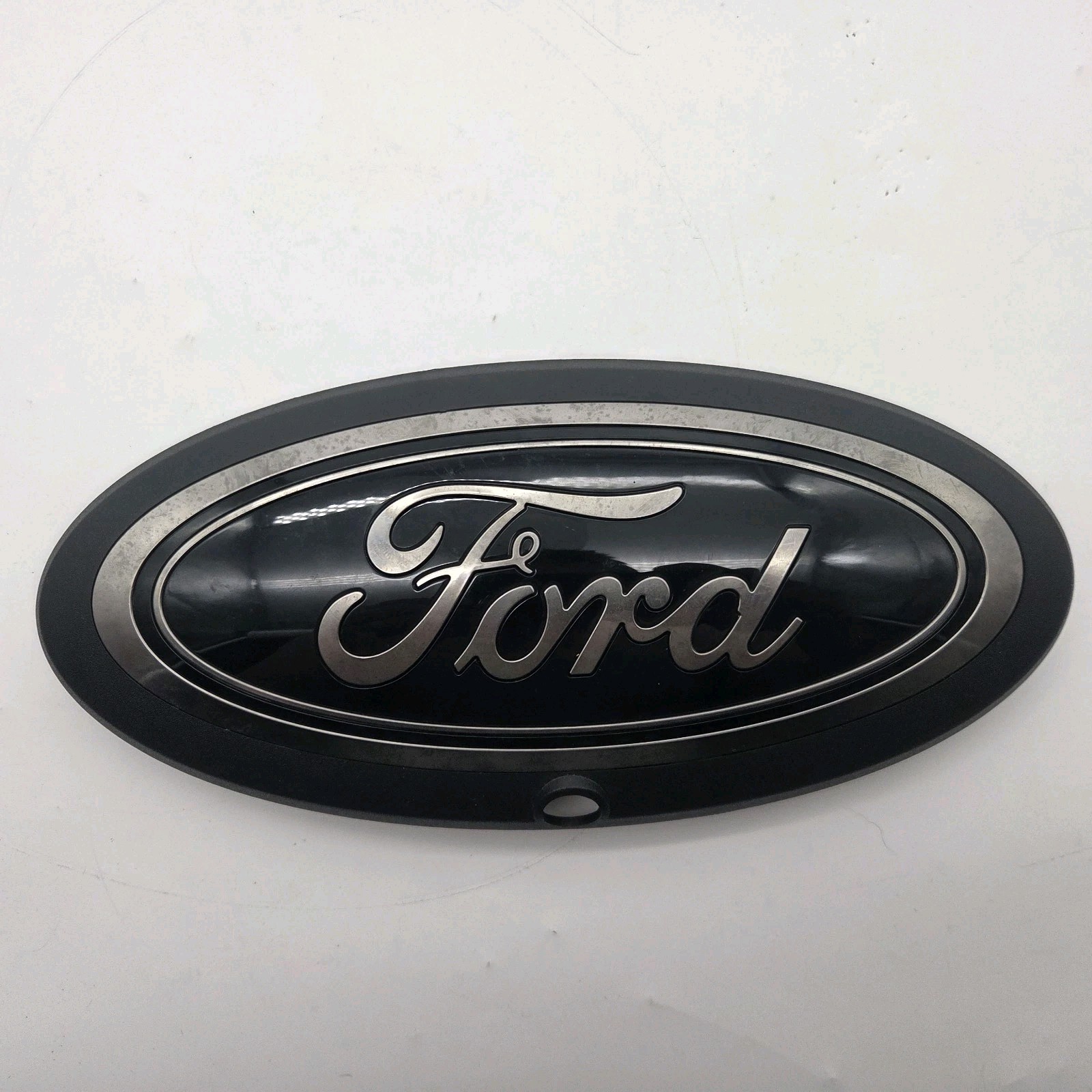 20 thru 21 Ford Tremor Super Duty OEM Black Grille Emblem w/ Front Camera Prov. 20 thru 21 Ford Tremor Super Duty OEM Black Grille Emblem w/ Front Camera Prov.