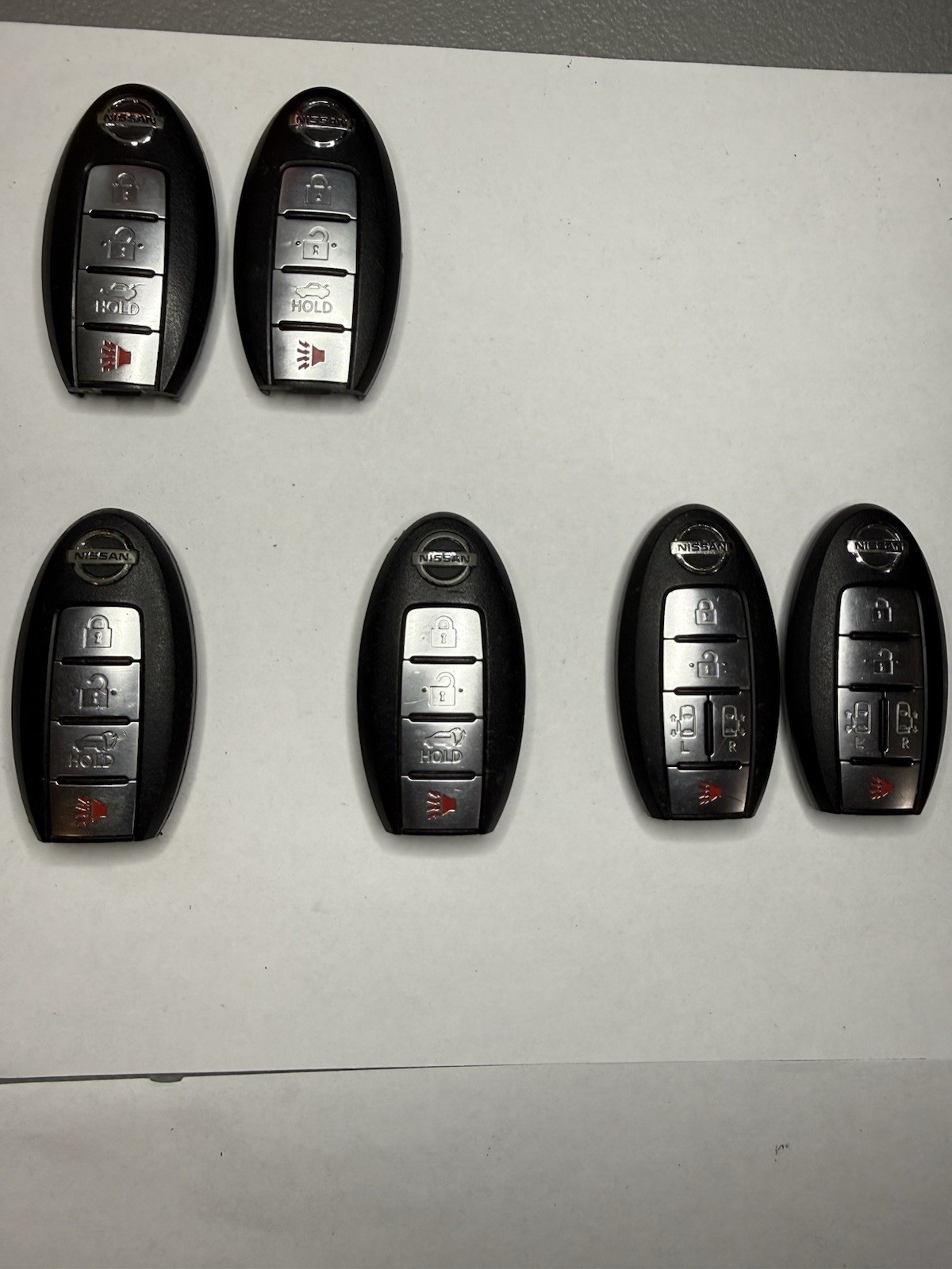 Lot of 6 OEM Nissan Smart Keys Mixed FCC Used Locked