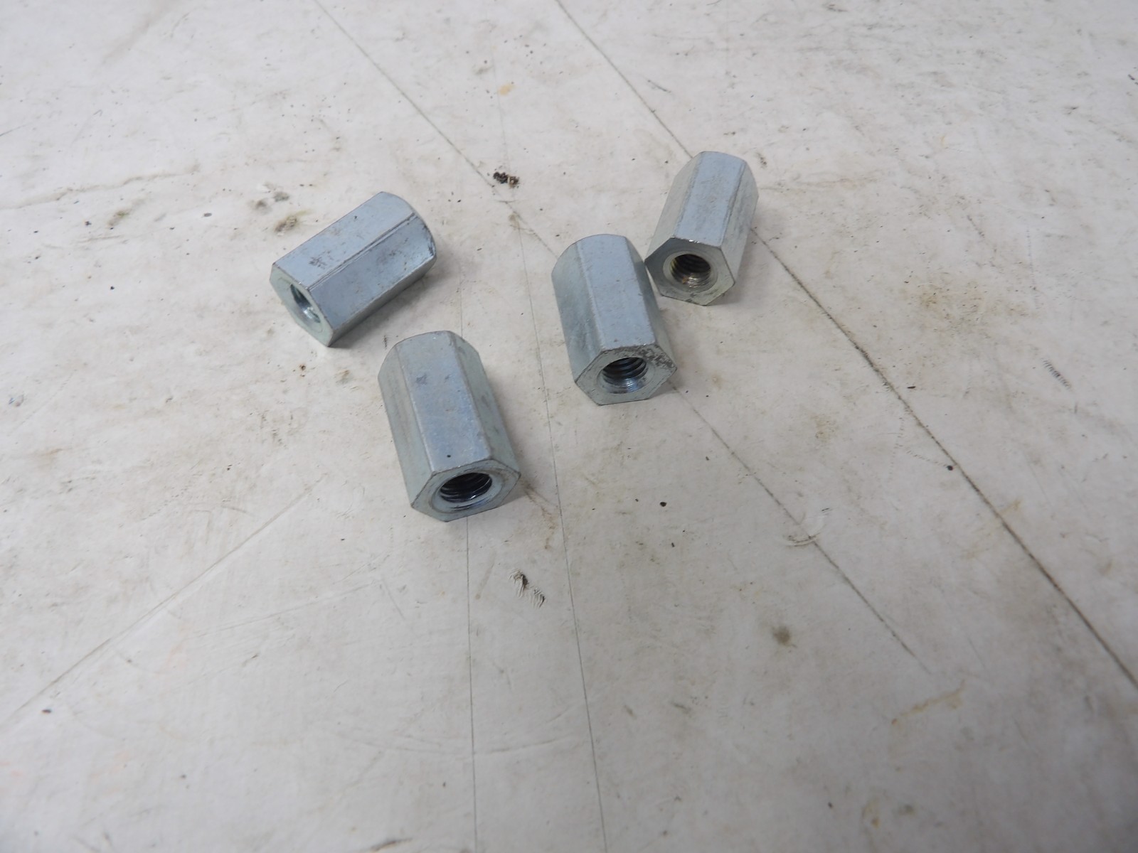 Set of 4 New NOS Hodaka Cylinder Head Nuts 902503 Models 90,92,92B,93, 93B,96,82 Set of 4 New NOS Hodaka Cylinder Head Nuts 902503 Models 90,92,92B,93, 93B,96,82