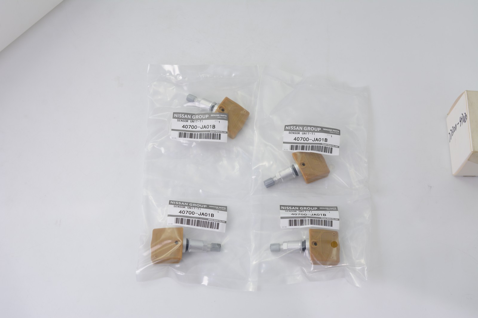 New 4PCS OEM 40700-JA01B TPMS Tire Pressure Sensor for Nissan EX35 FX Frontier